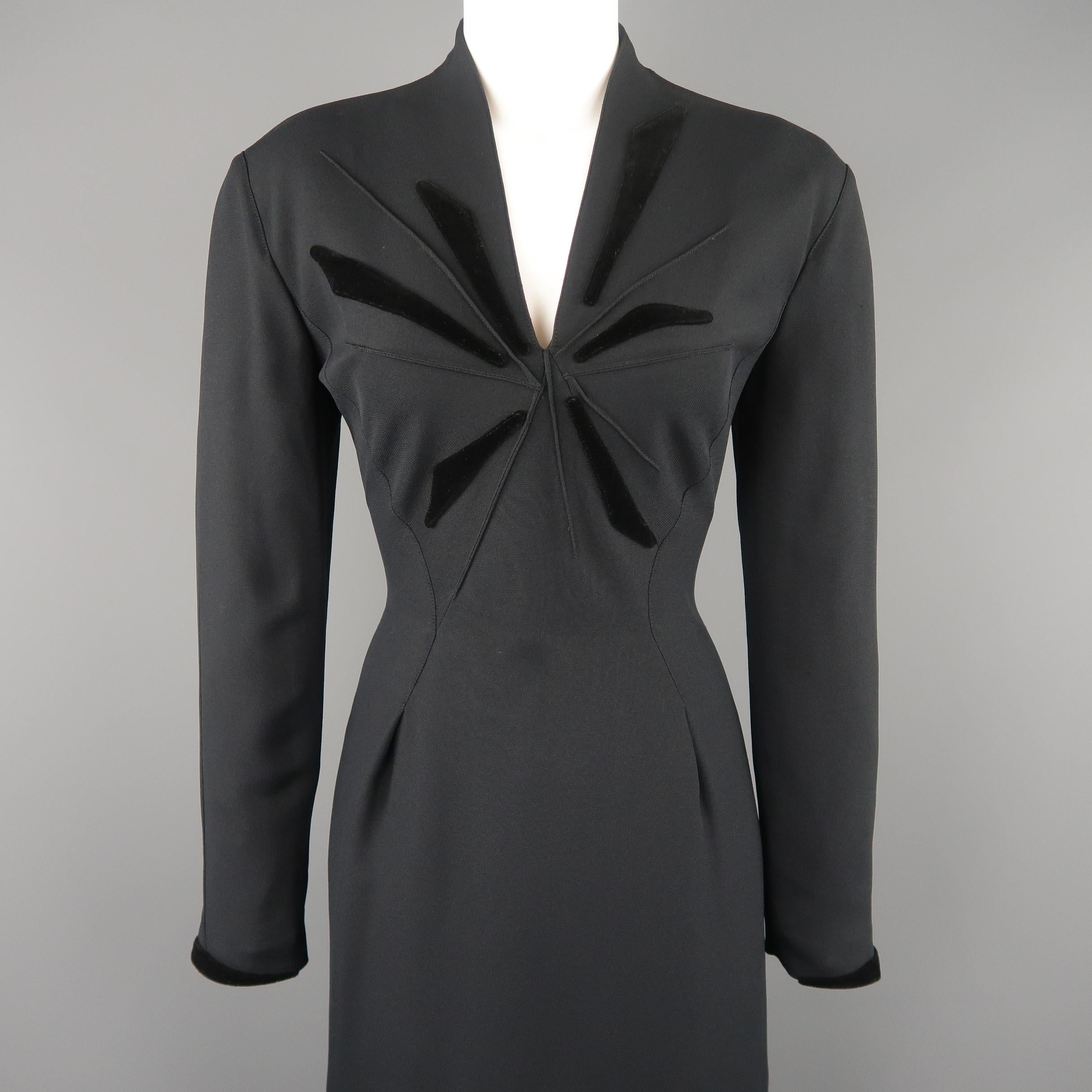 Vintage 1990's THIERRY MUGLER cocktail dress comes in black fabric with a v neck line accented by velvet appliques, long sleeves with velvet trim, and A line pencil skirt with velvet ruffle hem added. Made in France.
 
Excellent Pre-Owned