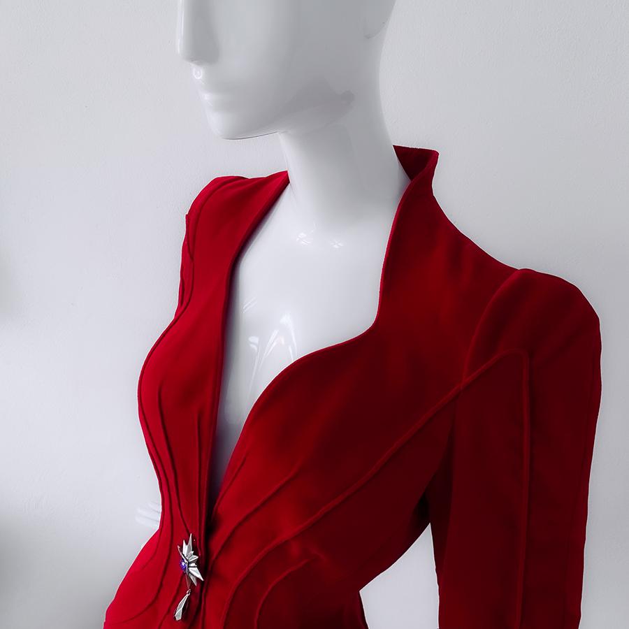 
Museum worthy collectors piece and strong camp vibe. The most amazing saturated deep red velvet Thierry Mugler blazer jacket with fabulous crystal star gems. Assuming FW 1992 collection.
Deep saturated cardinal/crimson red blazer with extremely