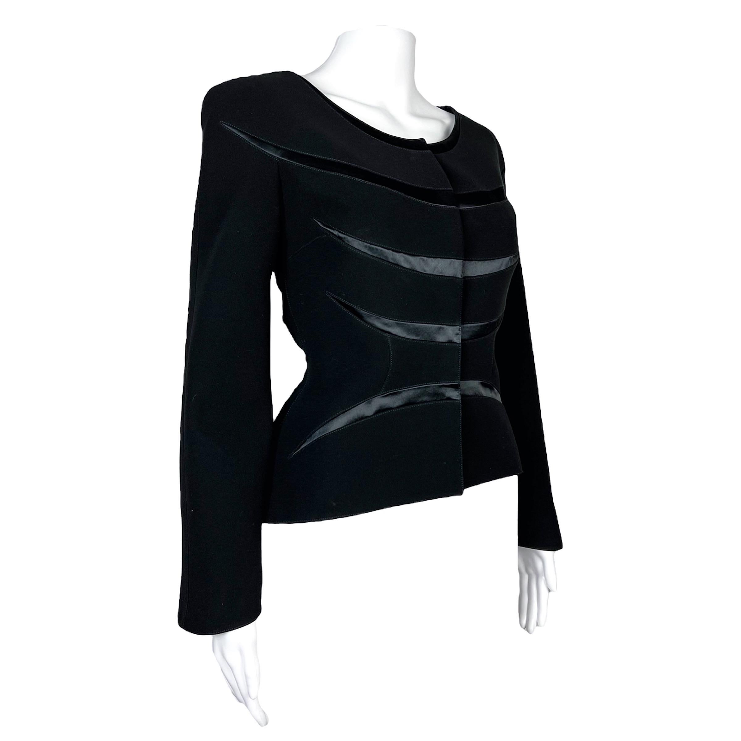Lovely Thierry Mugler black blazer with satin stripes on front and back from Spring Summer 2000 collection as seen on the runway that season. 

Size on tag is 42, make sure to report to measurements for accurate fitting. 

Measurements: 

Shoulders: