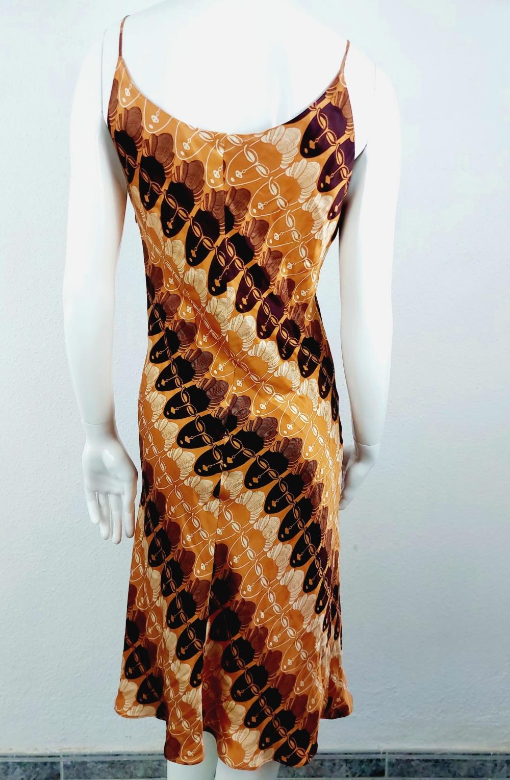 Thierry Mugler Tiki Mask Faces Ethnic African Tribal Silk Split Asymmetric Soie Midi Summer Dress

THIERRY MUGLER
  Trival faces print knee length DRESS, size: 40 (S/M)

Fabulous and impeccable knee-length dress, with a peculiar print of tribal