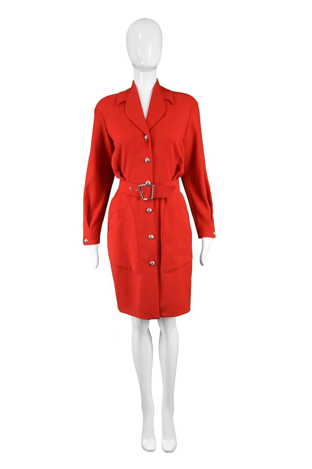 Thierry Mugler Vintage 1980s Red Wool Long Sleeve Shoulder Pads Shirtdress

Estimated Size: UK 10/ US 6/ EU 38. Please check measurements. 
Bust - 36” / 91cm (has a loose, blouson fit on top)
Waist - 28” / 71cm
Hips - 36” / 91cm
Length (Shoulder to