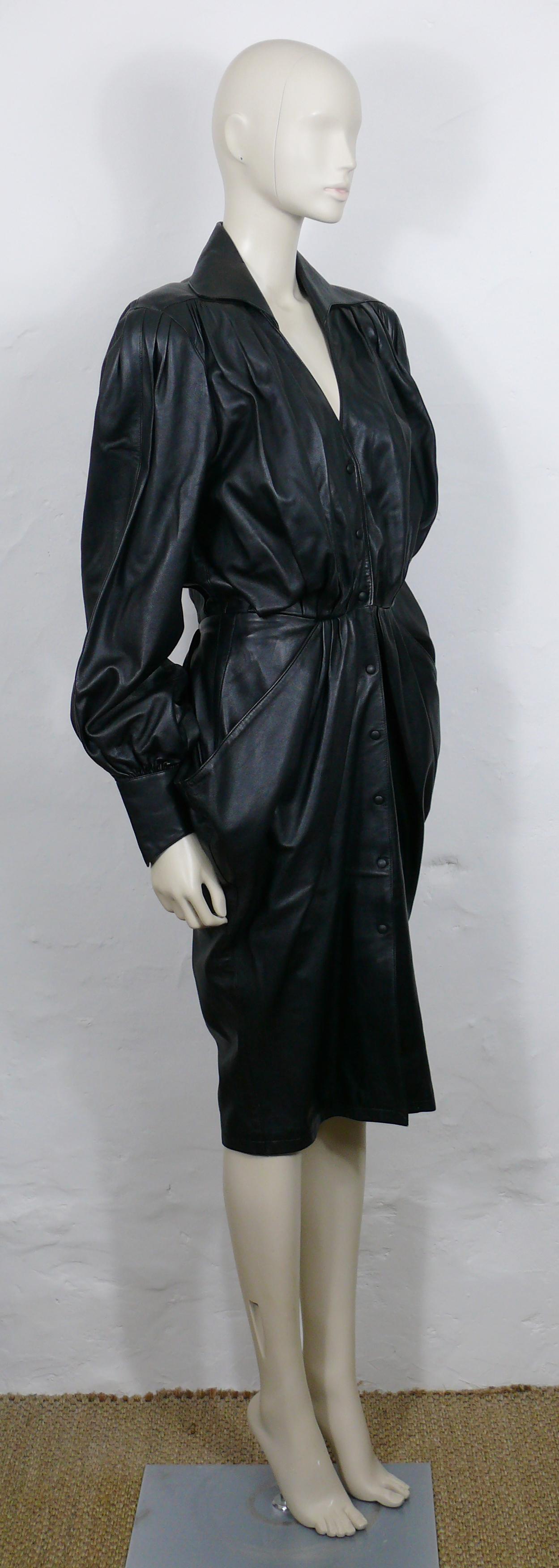 THIERRY MUGLER vintage black leather dress featuring MANFRED THIERRY MUGLER's typical sculptural cut, sensuality and aesthetic.

This dress features :
- Soft black leather (probably lambskin).
- Tight waist.
- Exagerated shoulders with shoulder