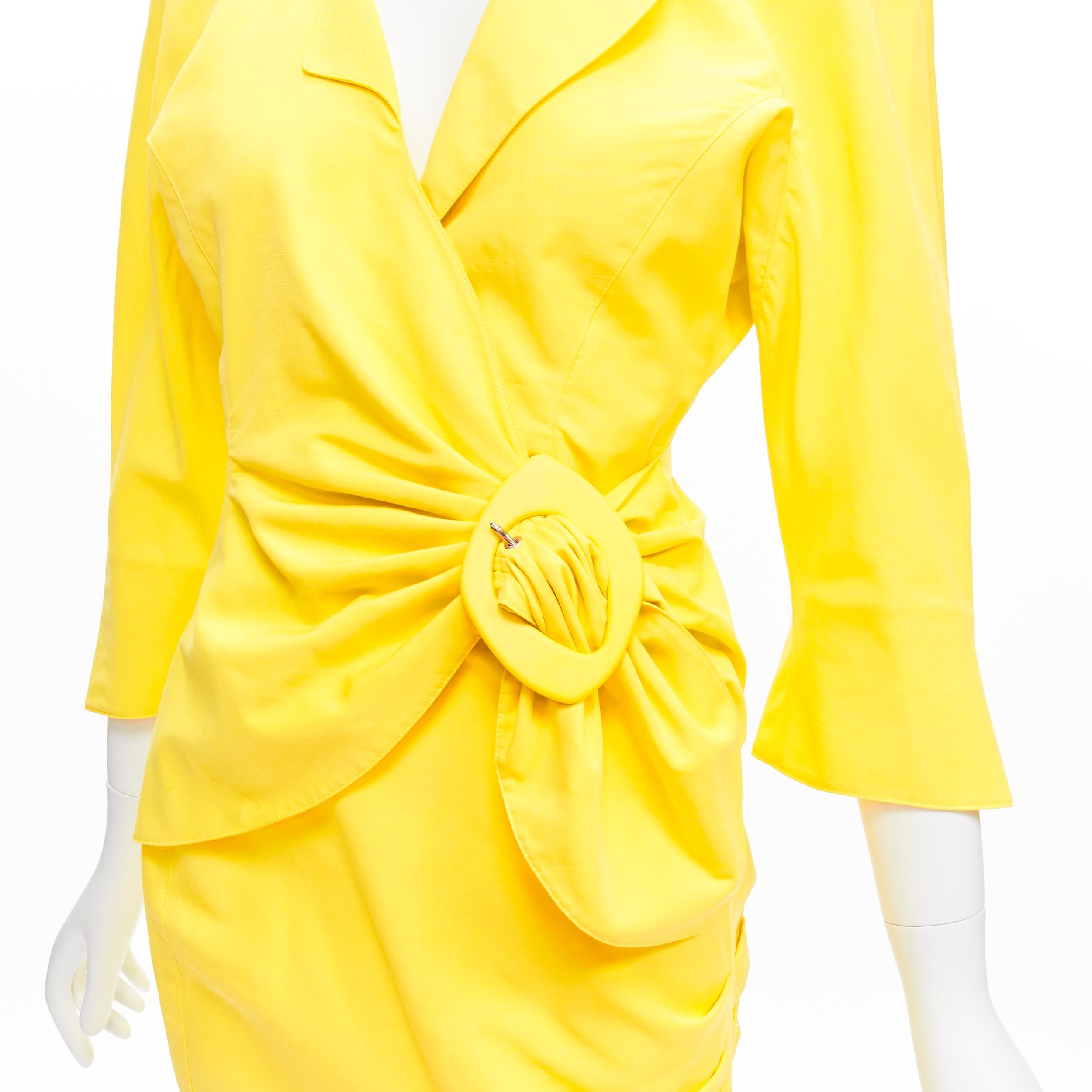 THIERRY MUGLER Vintage bright yellow wrap front vampire collar ruffle skirt suit IT7AR
Reference: TGAS/D00121
Brand: Thierry Mugler
Designer: Thierry Mugler
Material: Polyester, Linen
Color: Yellow
Pattern: Solid
Closure: Snap Buttons
Lining: Yellow