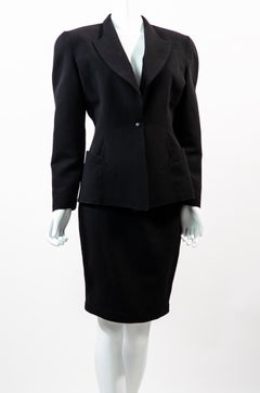 Thierry Mugler vintage suit 1980s black wool with dramatic hourglass silhouette