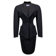 Thierry Mugler vintage suit 1980s black wool with dramatic hourglass silhouette