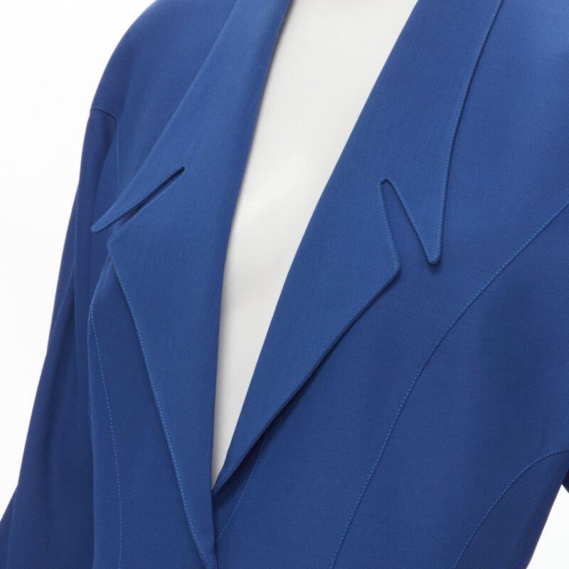 THIERRY MUGLER Vintage cobalt blue futuristic collar peplum jacket FR42 L
Reference: GIYG/A00163
Brand: Thierry Mugler
Designer: Thierry Mugler
Material: Viscose, Acetate
Color: Blue
Pattern: Solid
Closure: Snap Buttons
Extra Details: Futuristic