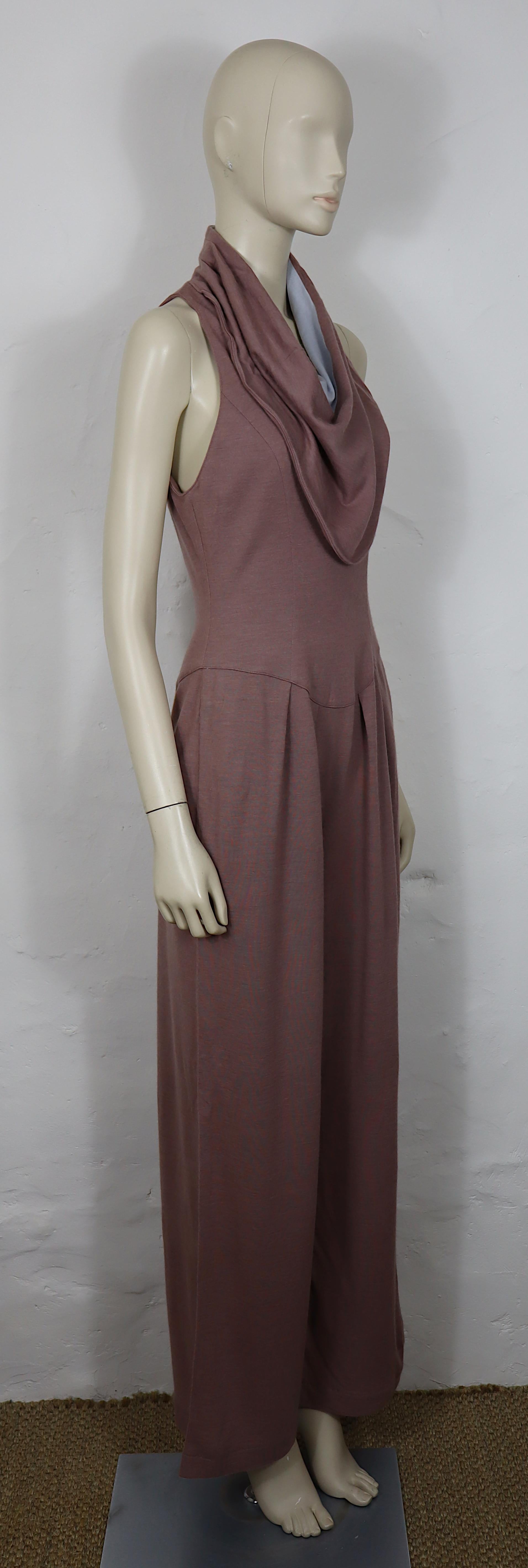 THIERRY MUGLER vintage jumpsuit featuring a drape neck.

This jumpsuit features :
- Fluid mixed wool fabric.
- Bicolour drape neck.
- Back zippered closure.
- Snap button closure at the back of the neck.

Label reads THIERRY MUGLER Paris.
Made in