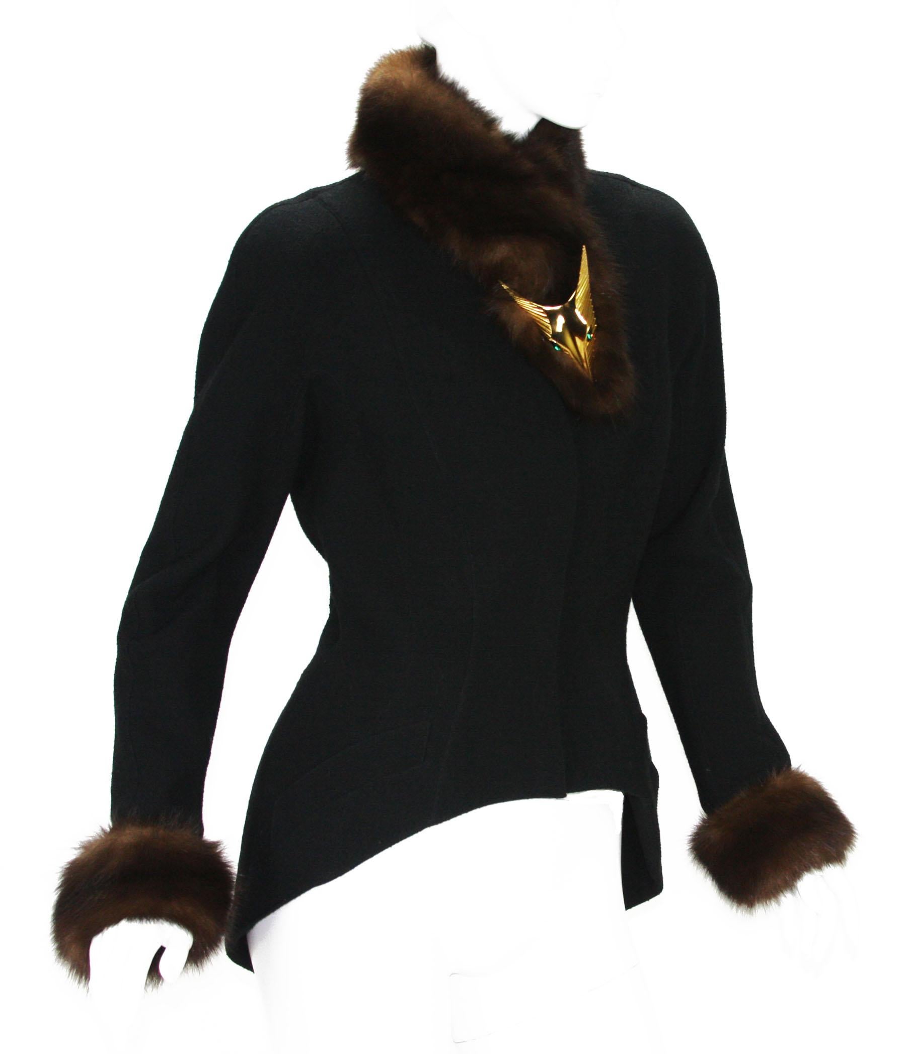  Thierry Mugler presents exquisite French craftsmanship with this exclusive brooch. Tailcoat blazer provides a dramatic silhouette, tailored to perfection. Featuring a mink collar with metal gold-tone fox face, snaps closure, little pockets, padded