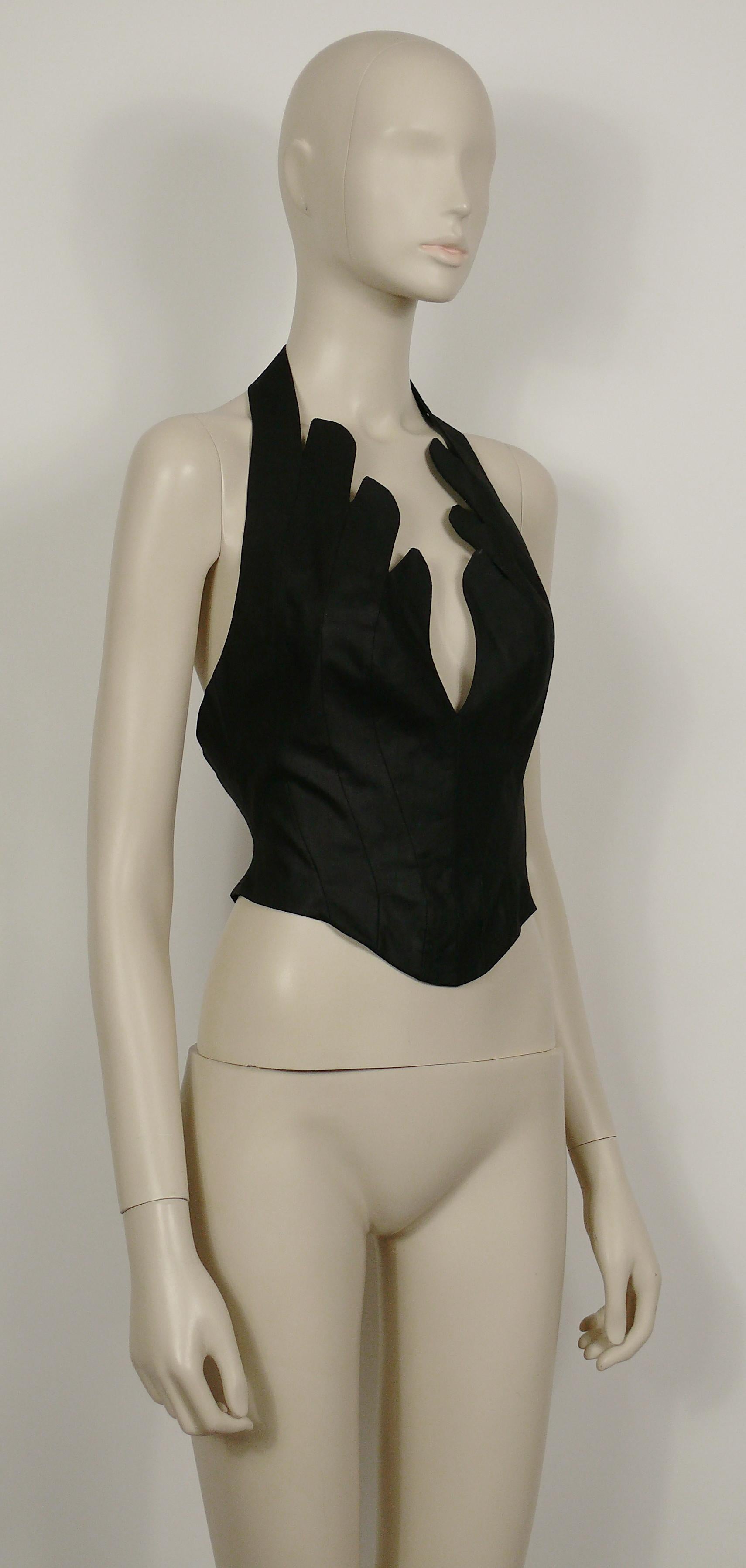 THIERRY MUGLER vintage iconic black coated cotton bustier corset with scalloped edges.

Snap button closure on the halter strap.
Hook and eye loop closure at the back.

Label reads THIERRY MUGLER Paris.
Made in France.

Size tag reads : 40.
Please