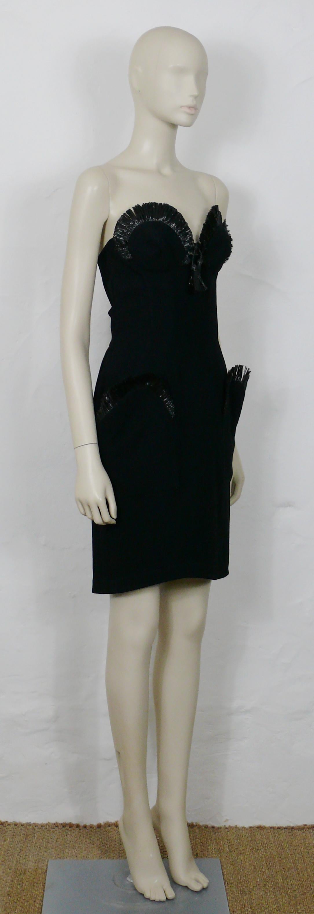 THIERRY MUGLER vintage iconic black raffia strapless dress from the Spring/Summer 1995 Collection.

A similar bustier worn by super model IRINA PANTAEVA at the Spring/Summer 1995 runway show (see picture).

This dress features :
- A sweetheart bust