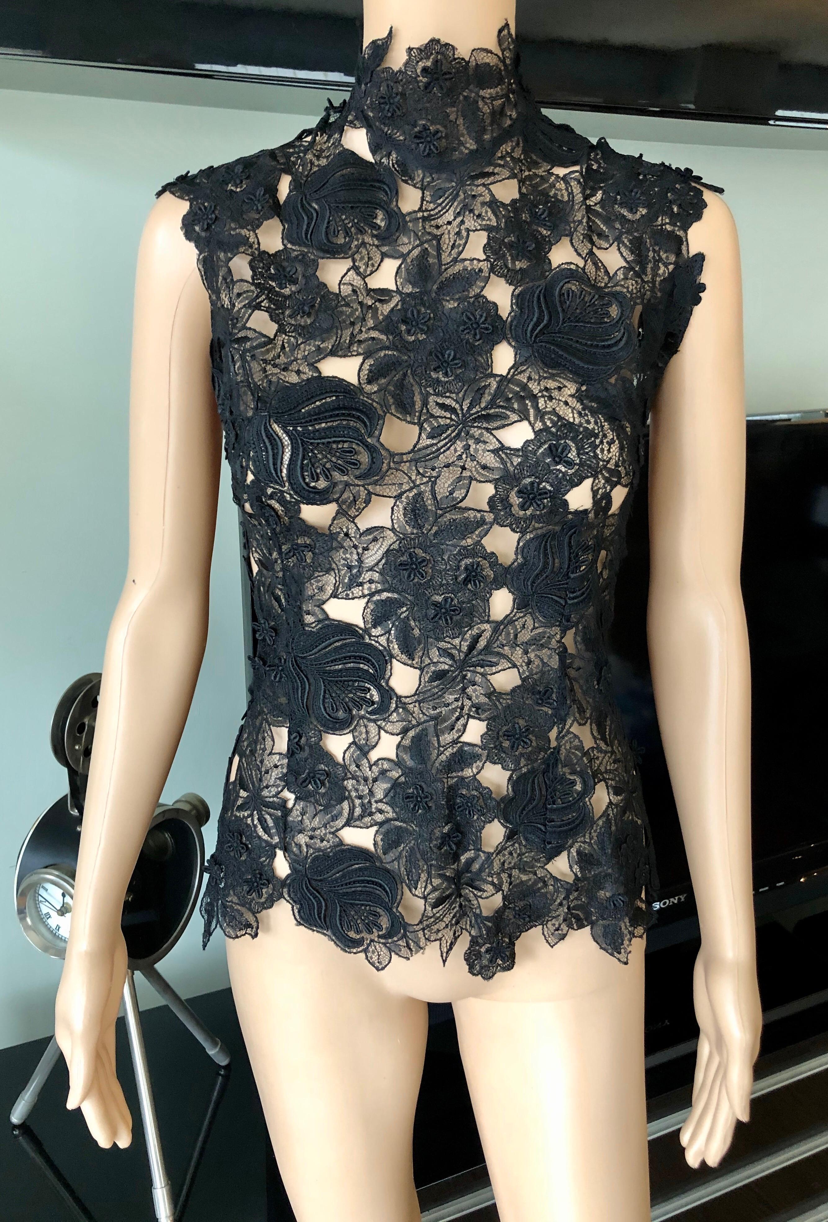 Thierry Mugler Vintage Lace Mock Neck Black Blouse Top FR 40

Thierry Mugler top featuring lace pattern, mock neck. and button closure at back.
