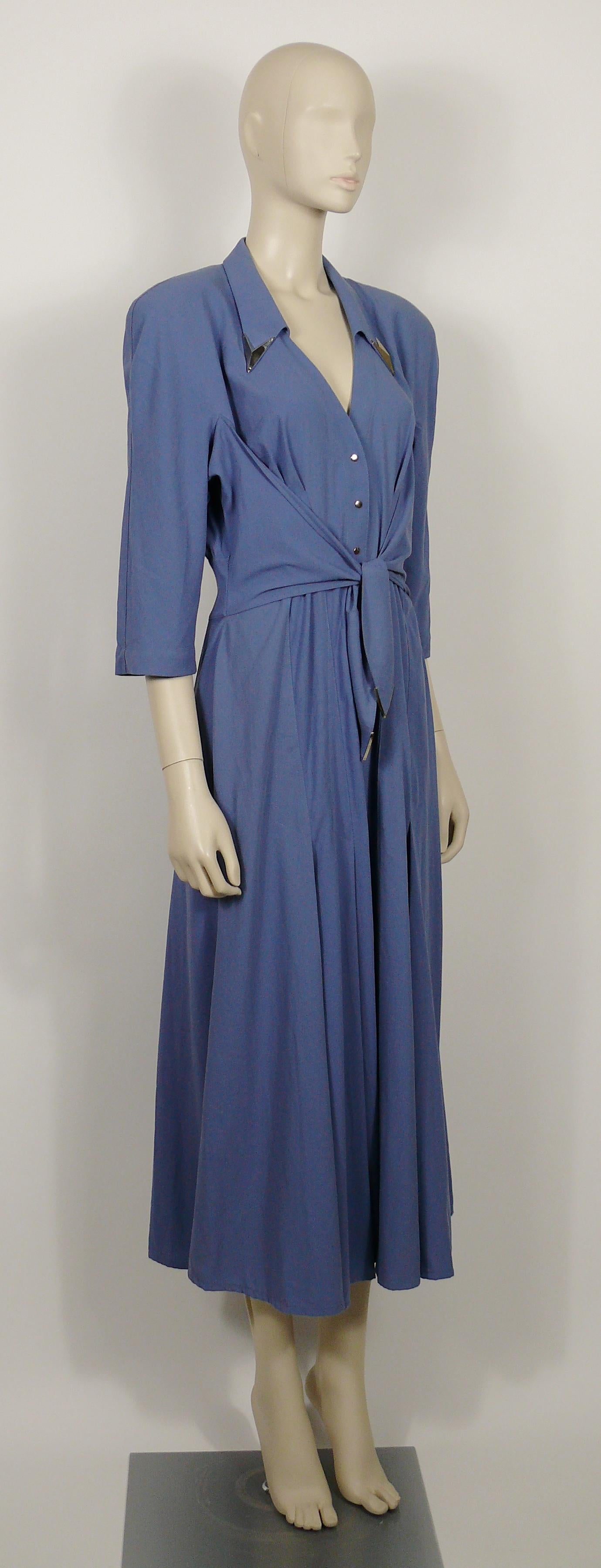 THIERRY MUGLER vintage blue maxi flowing dress featuring silver toned metal pointed appliques at the collar and belt.

Button-down snap closure.
Mid length sleeves.
Integrated belt.
Shoulder pads.
Unlined.

Label reads THIERRY MUGLER Paris
Made in