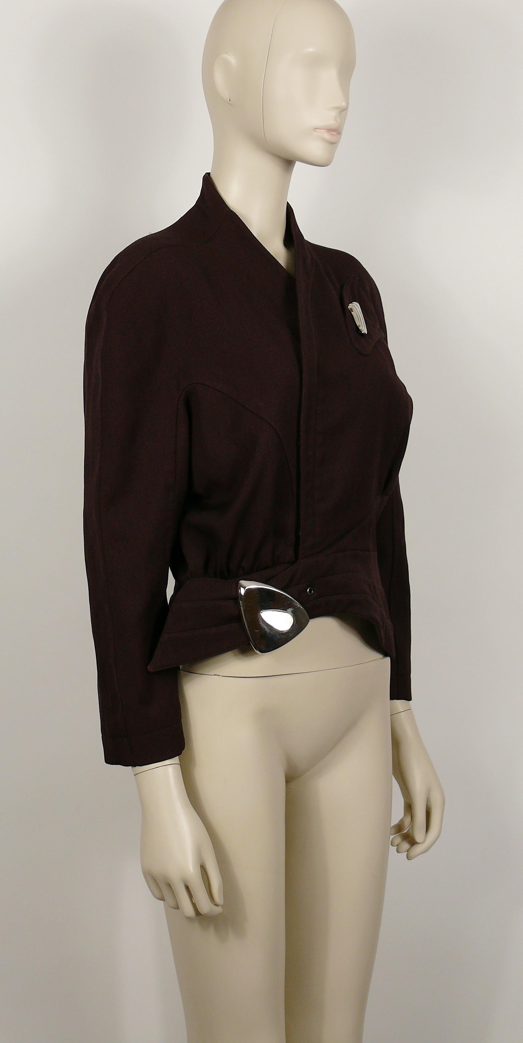 THIERRY MUGLER vintage plum asymmetrical iconic supple jacket featuring a large silver toned buckle detail and a removable wing like brooch.

This jacket is typical from THIERRY MUGLER's sculptural cut and aesthetic.

Hidden zip closure.
Fully