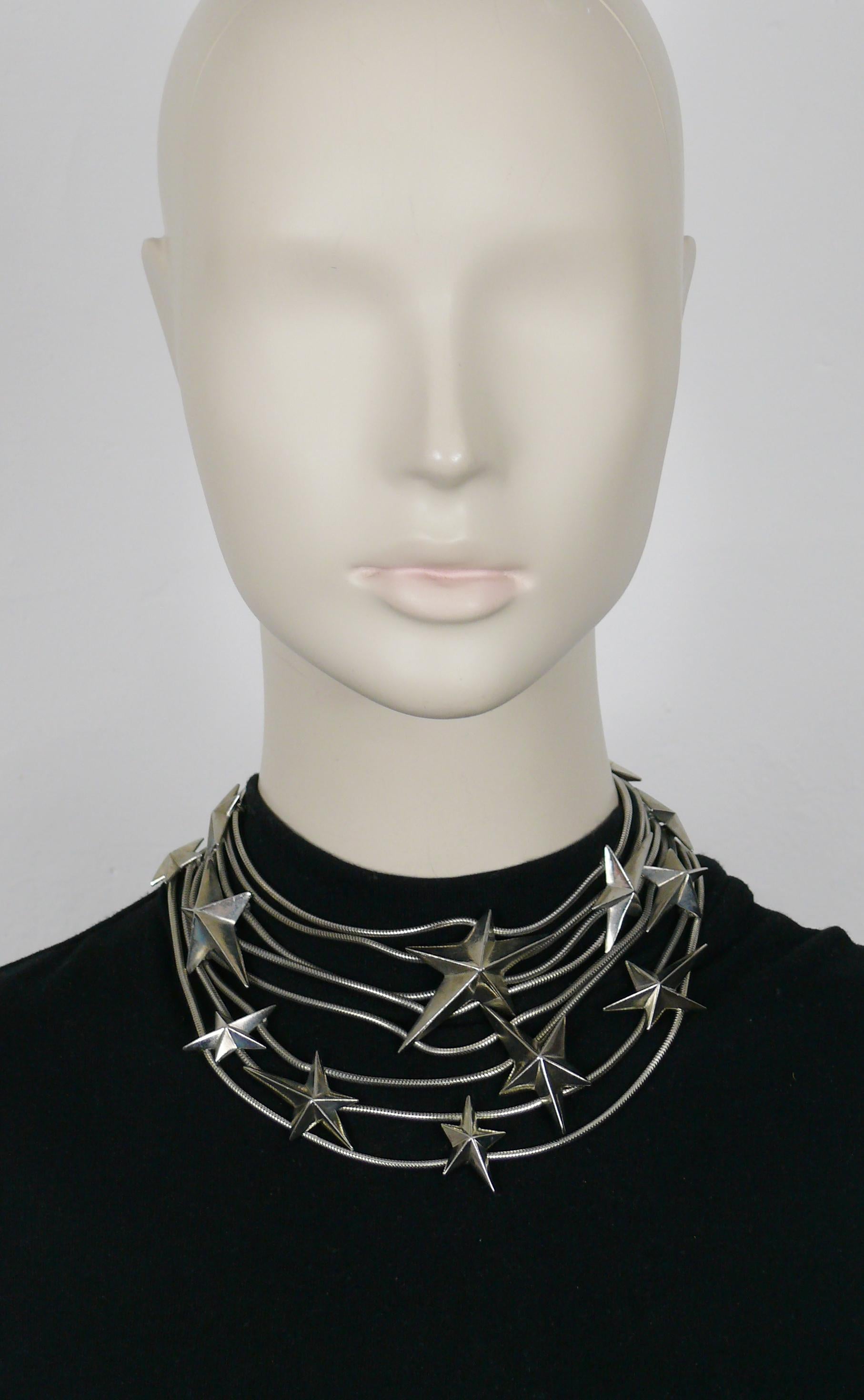 THIERRY MUGLER vintage antiqued silver tone multi strand snake chains choker necklace embellished with THIERRY MUGLER's iconic stars.

Adjustable T-bar and toggle closure.

Embossed THIERRY MUGLER.

Indicative measurements : adjustable length from