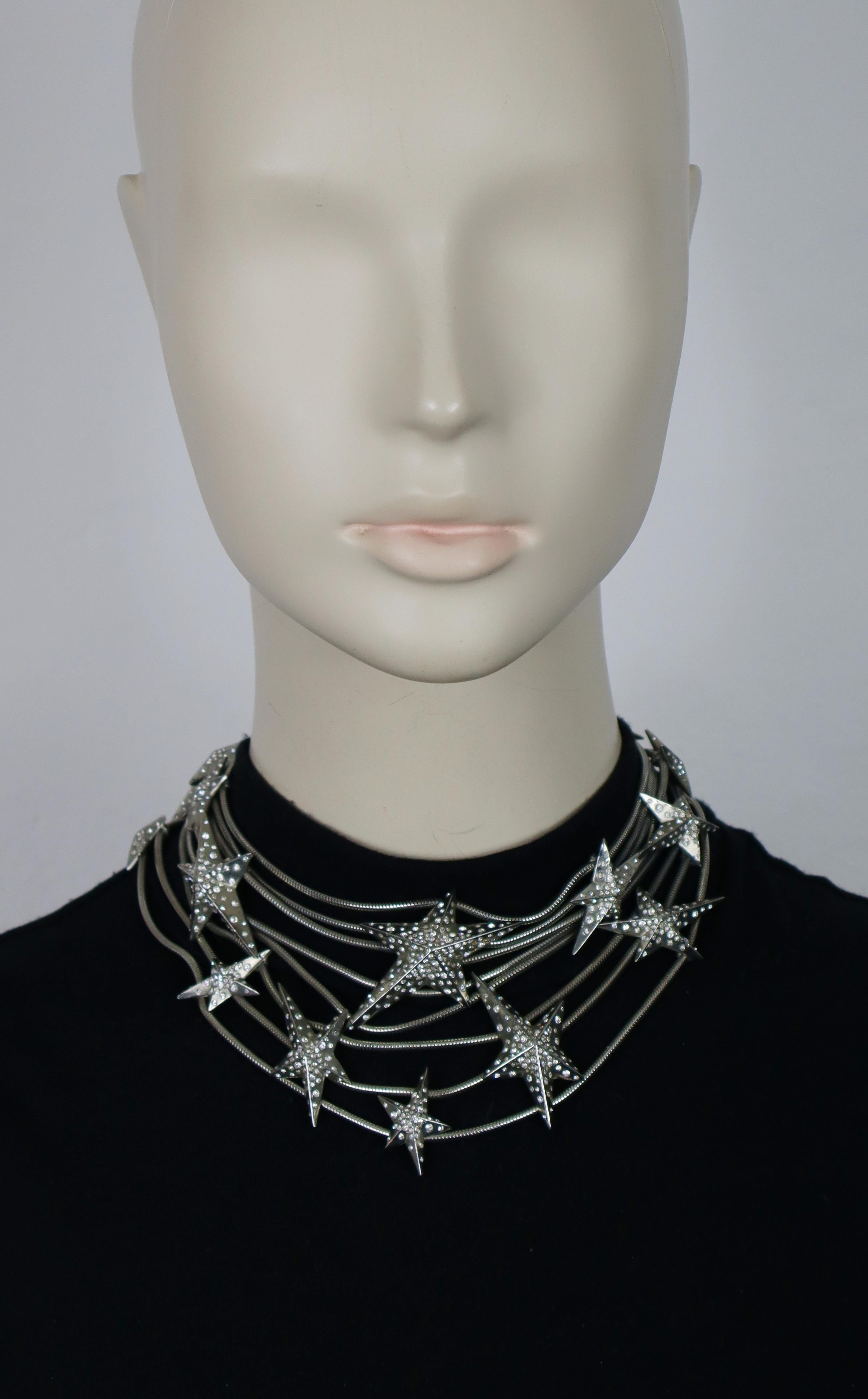 THIERRY MUGLER vintage silver tone multi strand snake chains choker necklace featuring THIERRY MUGLER's iconic stars embellished with clear crystals.

Adjustable toggle closure.

Embossed THIERRY MUGLER and TM.

Indicative measurements : adjustable