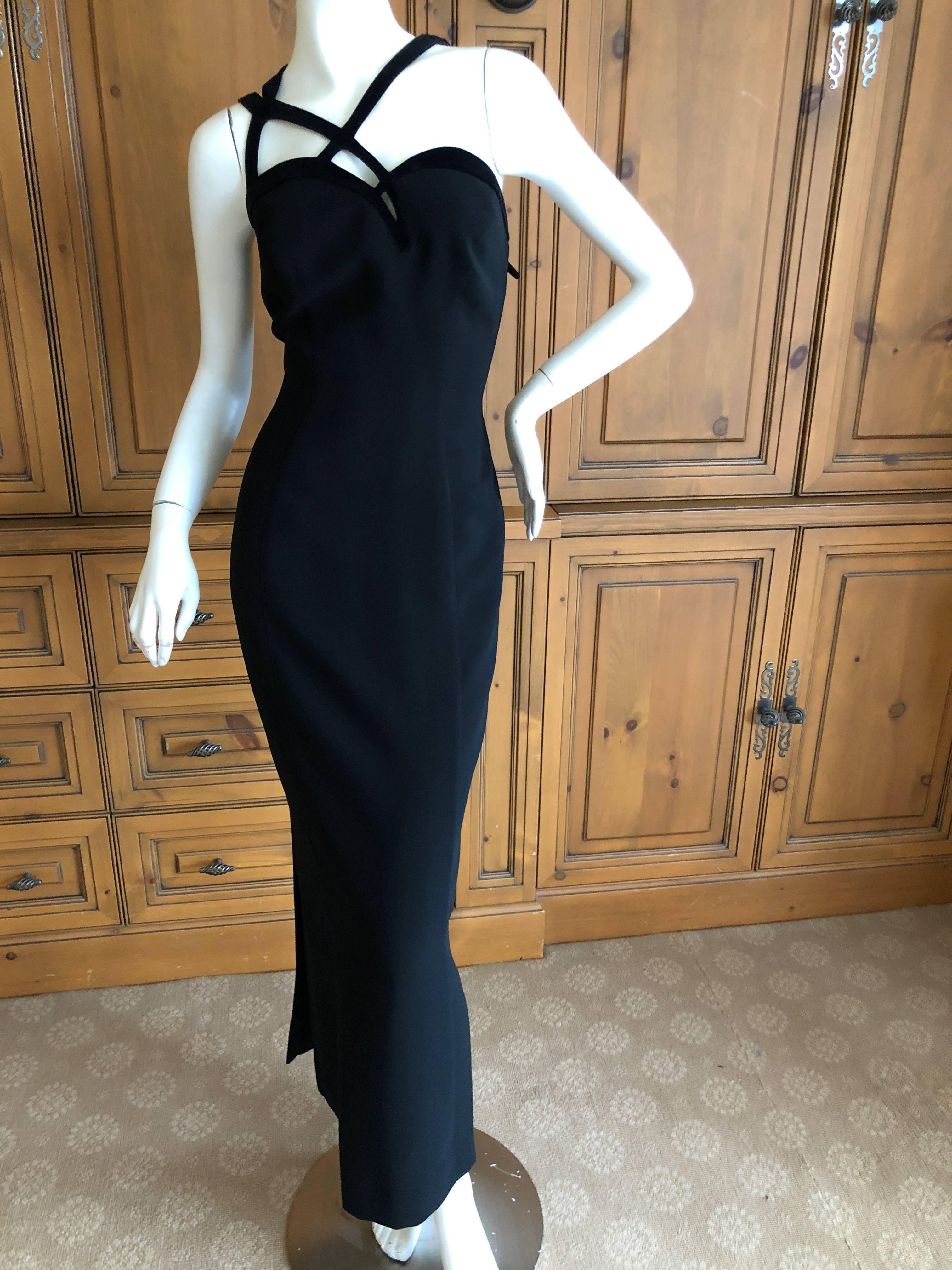 Beautiful black evening dress with velvet trim from Thierry Mugler.
Classic Mugler in a hard to find real size.
Size 44
Bust 36