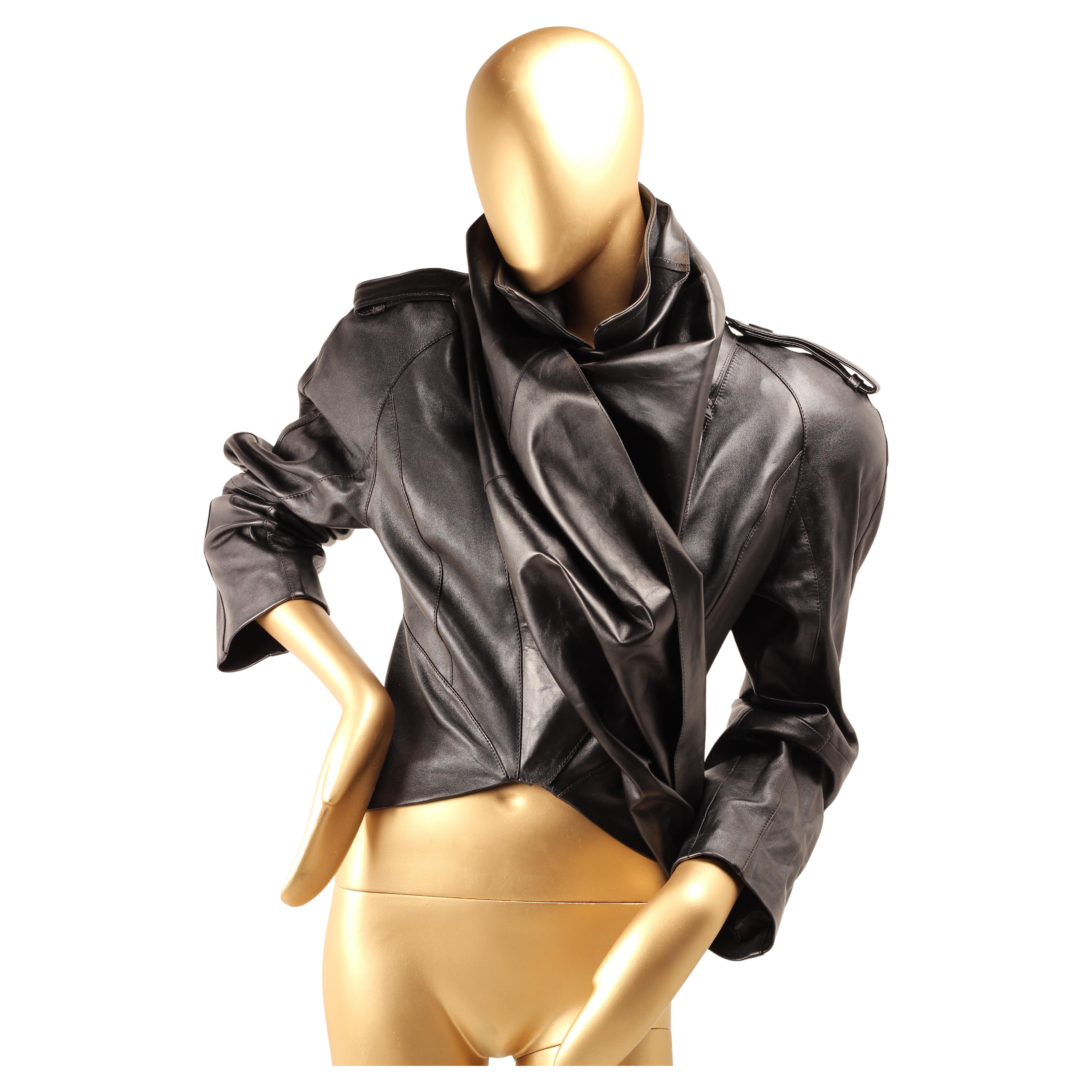Thierry Mugler x H&M Black Leather Cropped Jacket with Scarf, 2023

This Thierry Mugler x H&M black leather cropped jacket with built-in scarf (2023) is a rare and collectible piece from the global capsule collection designed under Casey