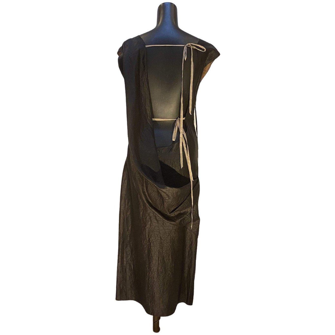 Gorgeous dark brown, acid-washed, sleeveless dress from vintage Thimister is 100% silk. The eye-catching deep draping in back is delicately secured by two sets of ribbons tied across the back, wrapping your body like a gift. The heavy-duty side