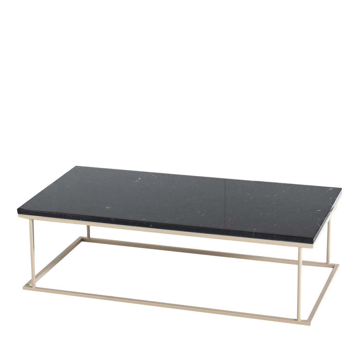 From a full collection of personalizable accent tables for contemporary living rooms, the Thin Coffee Table is characterized by its slim metal frame and rounded legs providing a fun contrast. The table is fully customizable in size, materials and
