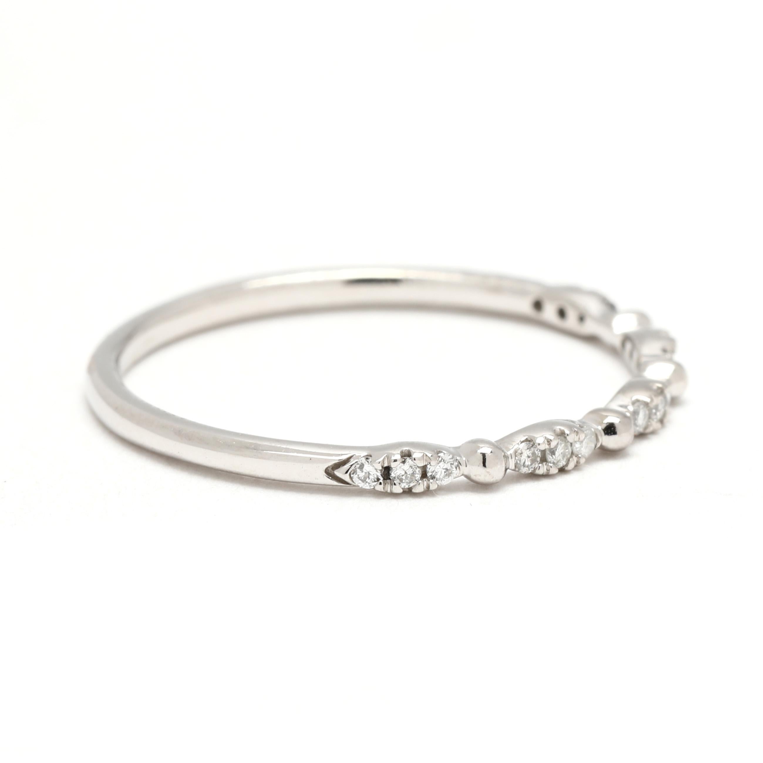 Pierres :
diamant, 15
taille ronde brillante
1.1 mm
environ .08 carats au total
Couleur HI/ SI2-I1

Bague taille 7

Hauteur du doigt : 1.8 mm

Largeur : 1.6 mm

Poids : .6 dwts/ 1 grammes

Tampons : 