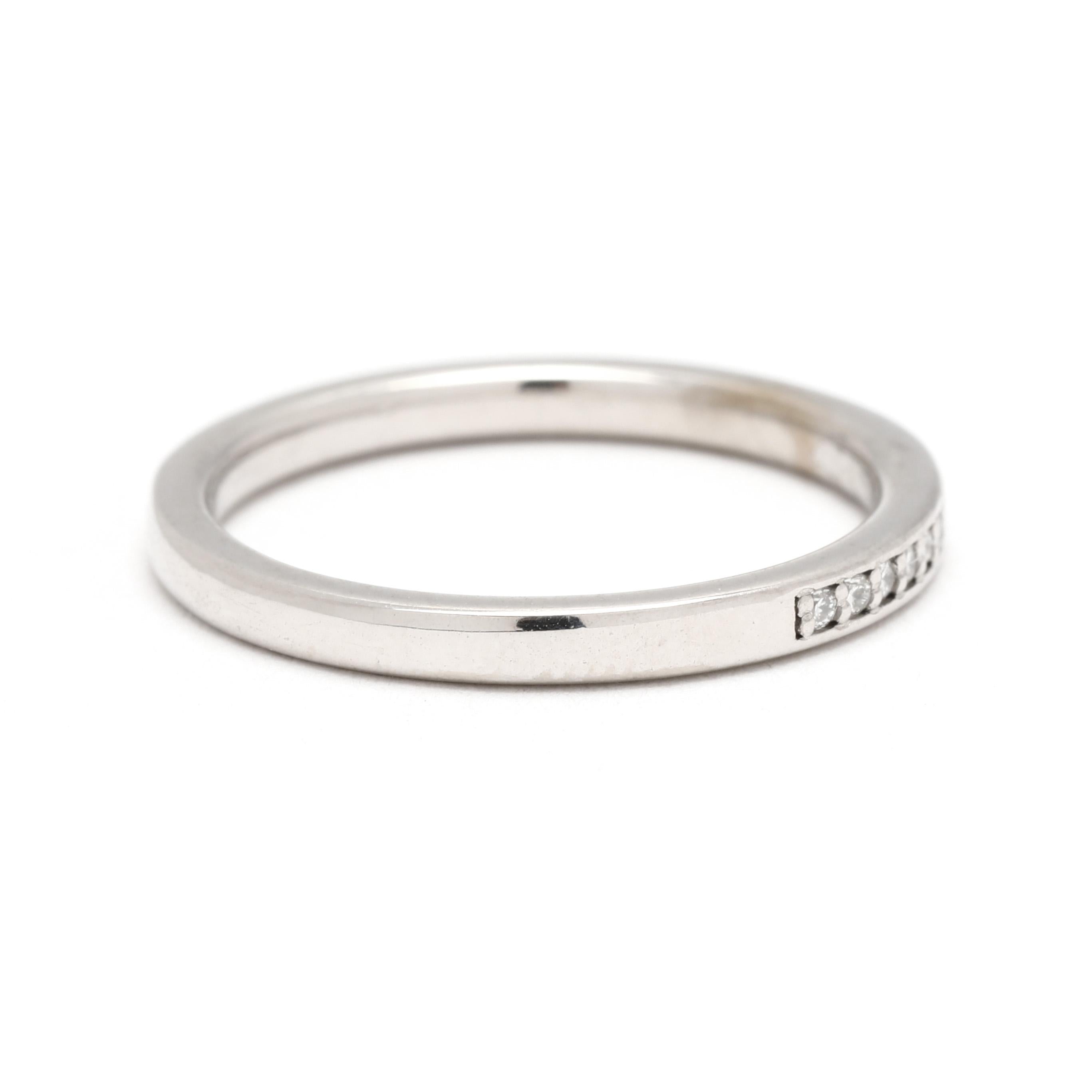 Stones:
diamonds, 10 sontes
round brilliant cut
1 mm
approximately .05 total carats
G-H color, SI1-2 clarity

Ring Size 5.5

Width: 1.9 mm

Weight: 2.1 dwts. / 3.3 grams

Stamps: 