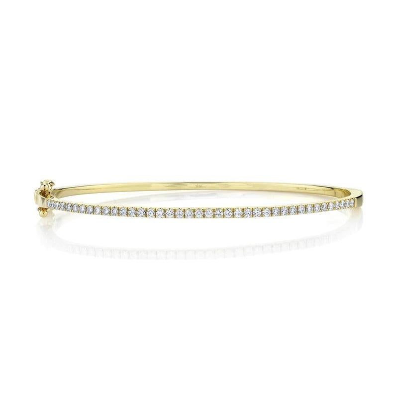 This beautiful 14 kt Yellow Gold Diamond Hinge Bracelet is so beautiful. It's perfect to wear alone or with to pair with your other favorites. 
I has 0.62ct Total Weight of pave mounted Diamonds.


