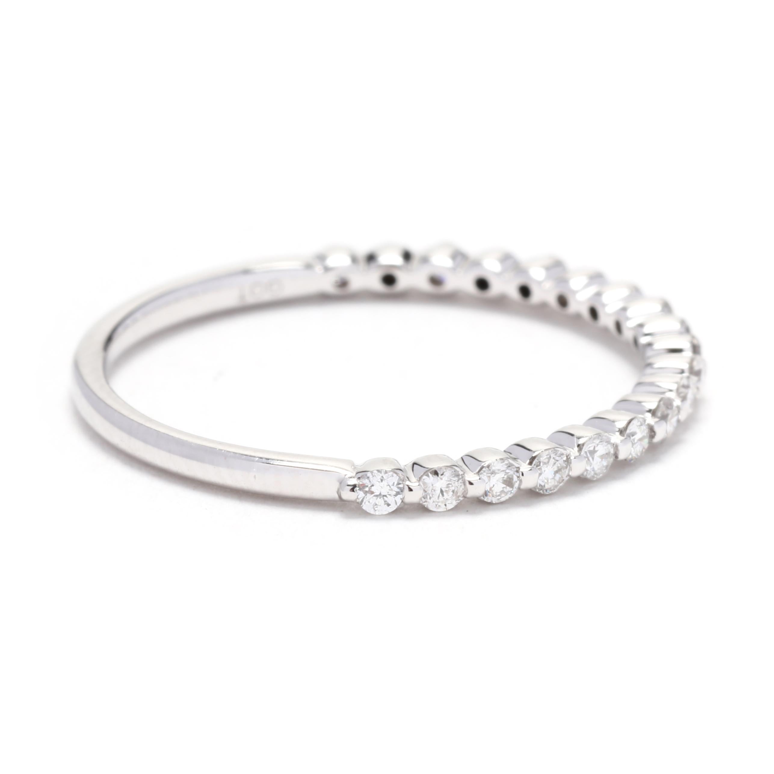 Add a touch of sparkle to your wedding day with this beautiful 0.30ctw thin diamond wedding band. Made in 14K white gold, this ring features a classic and timeless design that will never go out of style. The band is set with 15 round brilliant cut