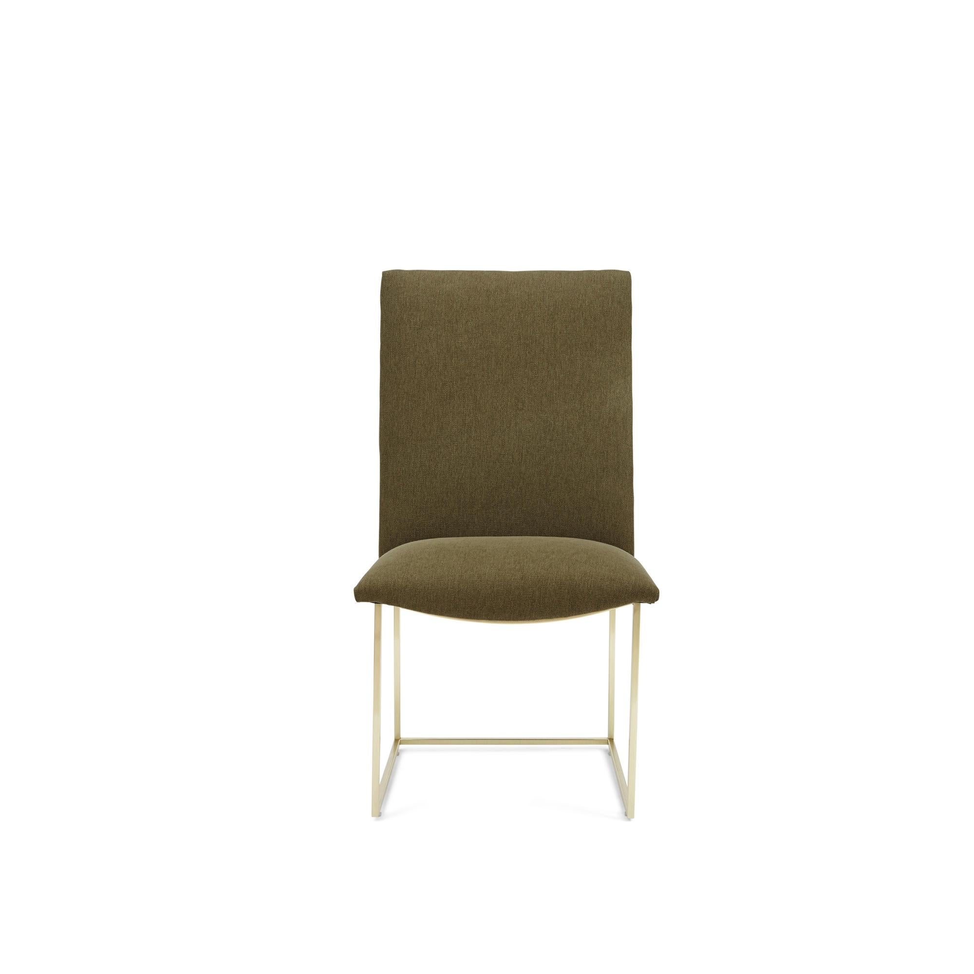 The thin frame dining chair features a high back and an armless silhouette that rest atop a thin metal base. Shown here with a satin brass base.

The Lawson-Fenning collection is designed and handmade in Los Angeles, California.

Can be made to