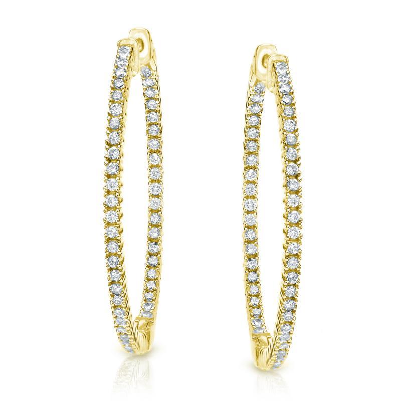 The Thin In And Out Diamond Hoop Earrings gracefully presents a fine sequence of small shimmering round cut diamonds placed in a classic prong setting in a unique inside out pattern on the gorgeous hoop earrings adding a voguish edge to your daily