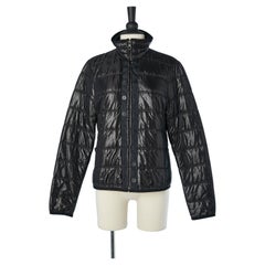 Thin padded black nylon jacket with zip in the middle front Chanel 