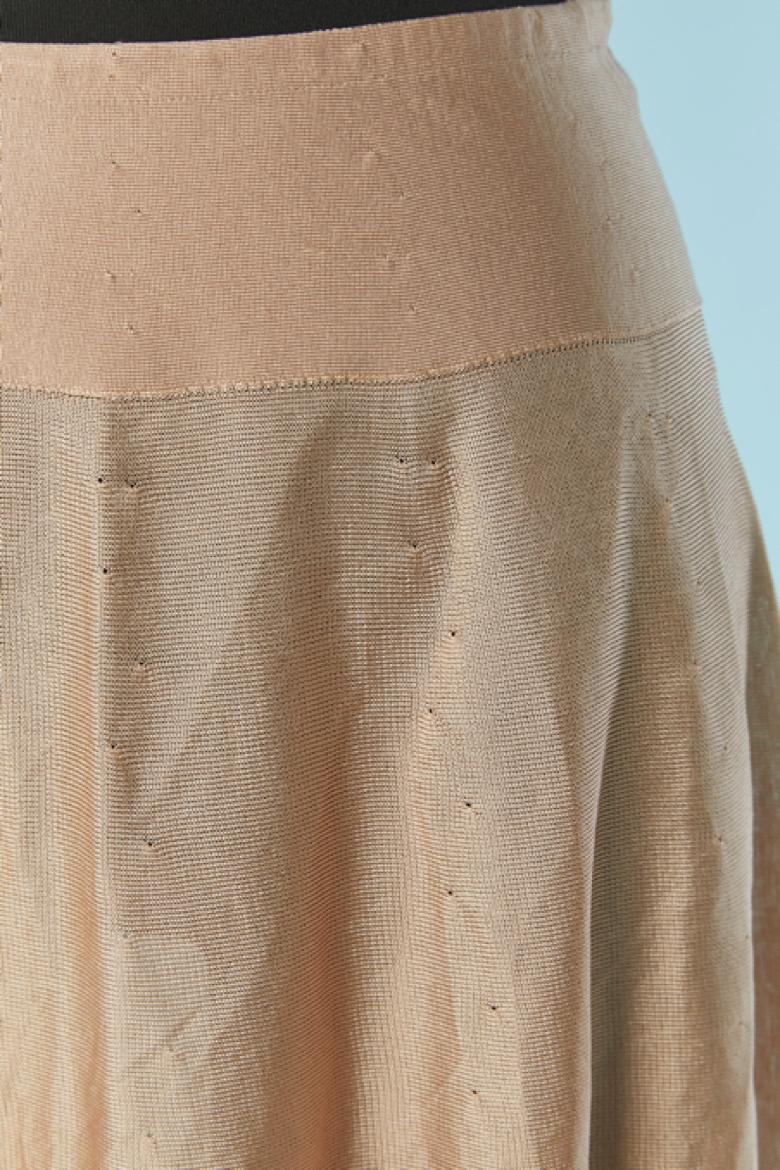 Thin see-through rayon jersey knit skirt. Jersey composition: 98% rayon, 2% nylon. 
Elastic band on the waist.  New with tag
SIZE 38 (It ) 34 (Fr) XS 