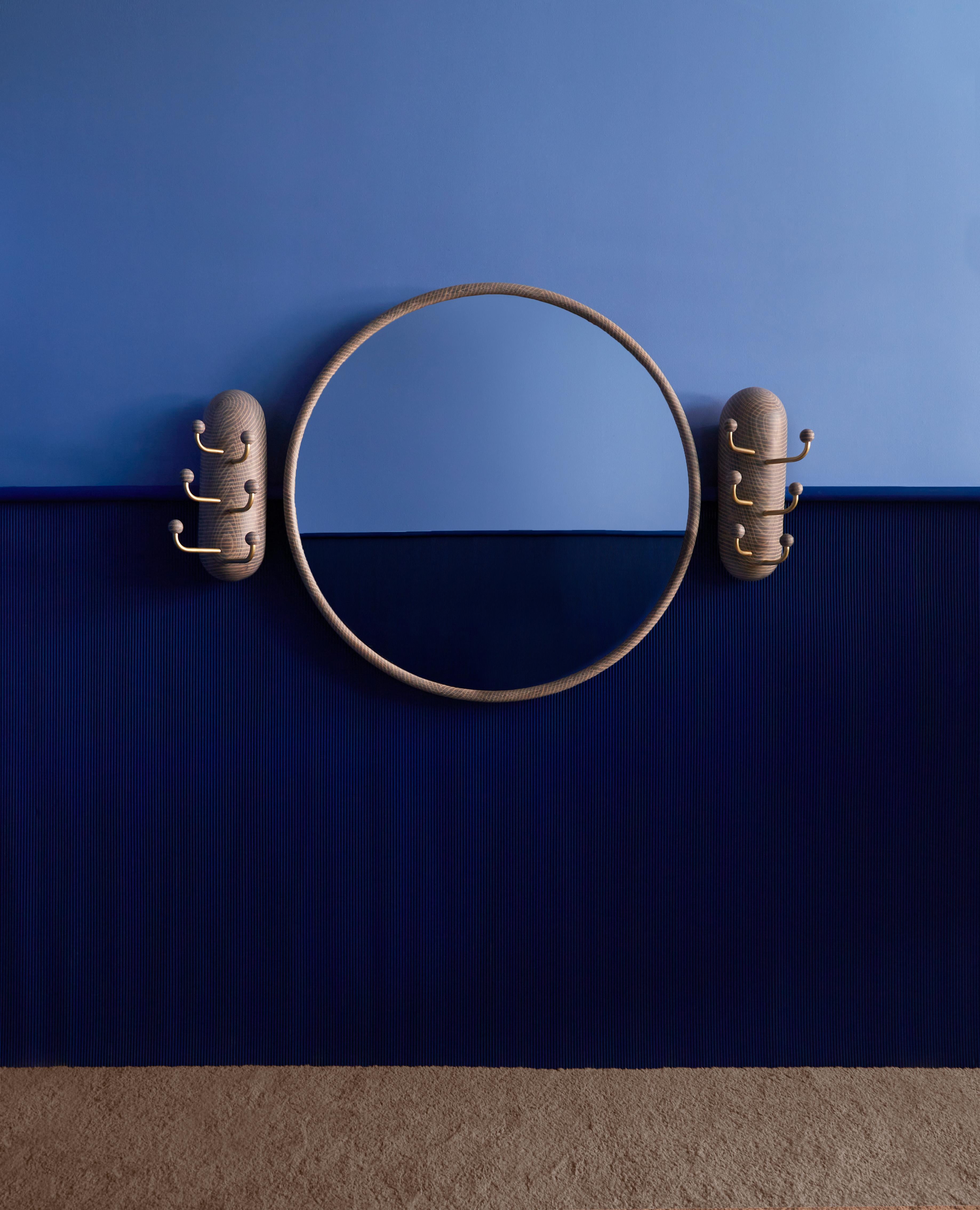 Thing 1 & 2 by Hamilton Holmes
Oxalino Collection
2020
Dimensions: H 58.8, W 17.8 projection 10.16-20.3 cm
Materials: White oak, brass tube, oxidized treatment

Two playful wall hanging hooks that mirror each other’s eccentricities. The white