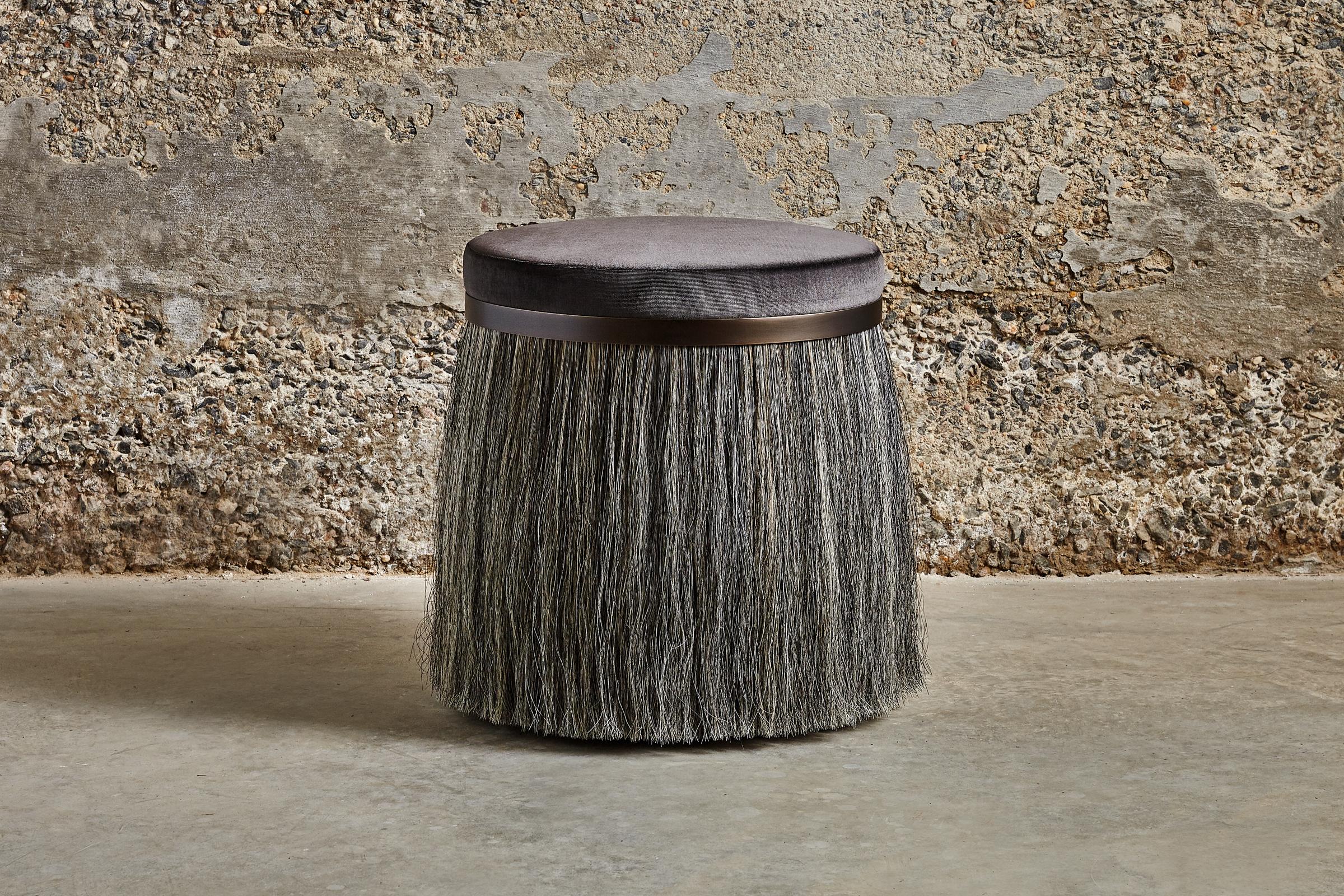 The Thing stools are available in four different styles and feature hand-upholstered tops, solid brass rings and horse hair. Refined yet wild, Thing 1's unique personality is accentuated with a distinctive combination of contrasting materials.