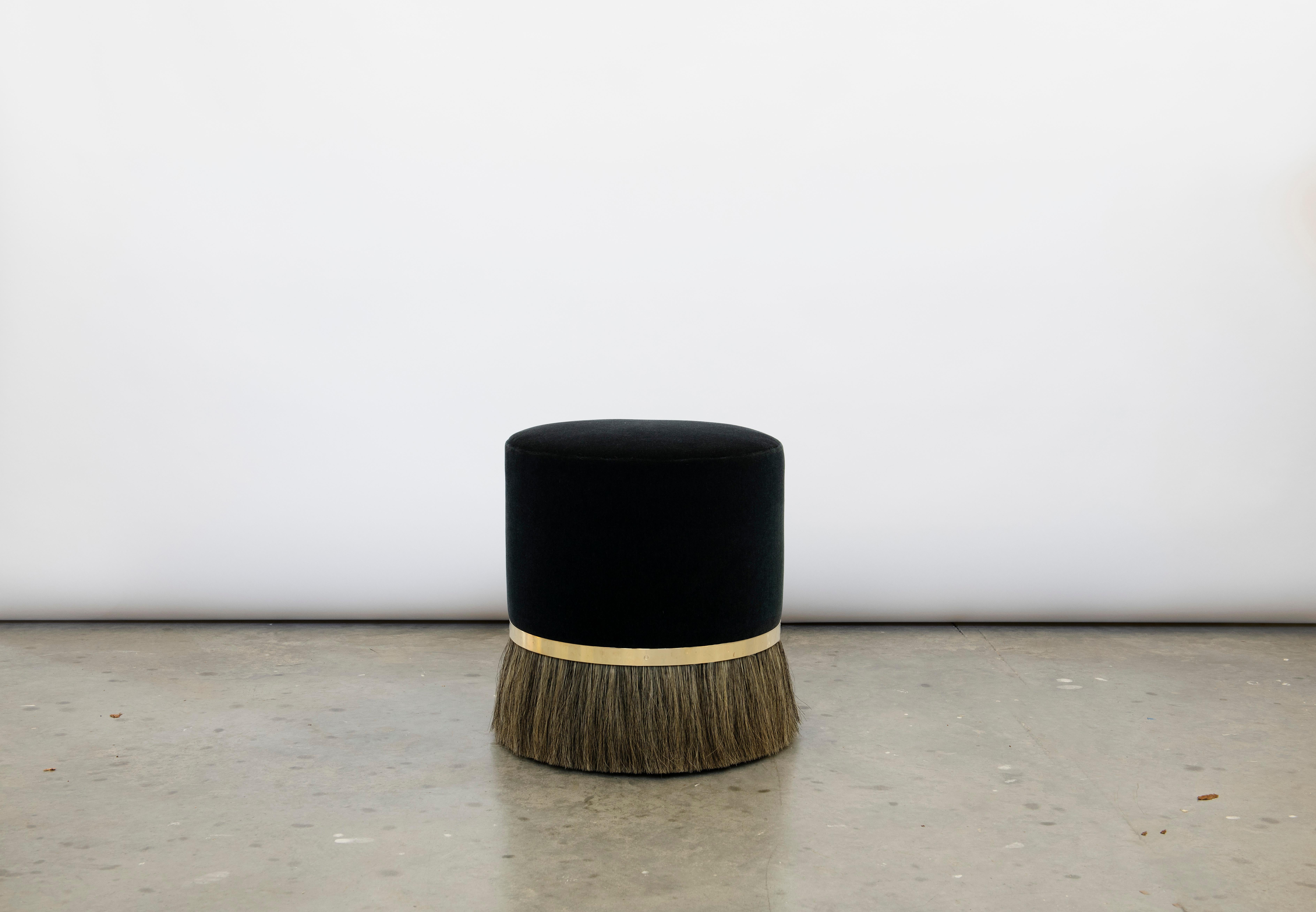 Refined yet wild, Thing 3's unique personality is accentuated with a distinctive combination of contrasting materials. This Thing 3 stool is in stock and available now as pictured, upholstered with black mohair, featuring medium silver horse hair