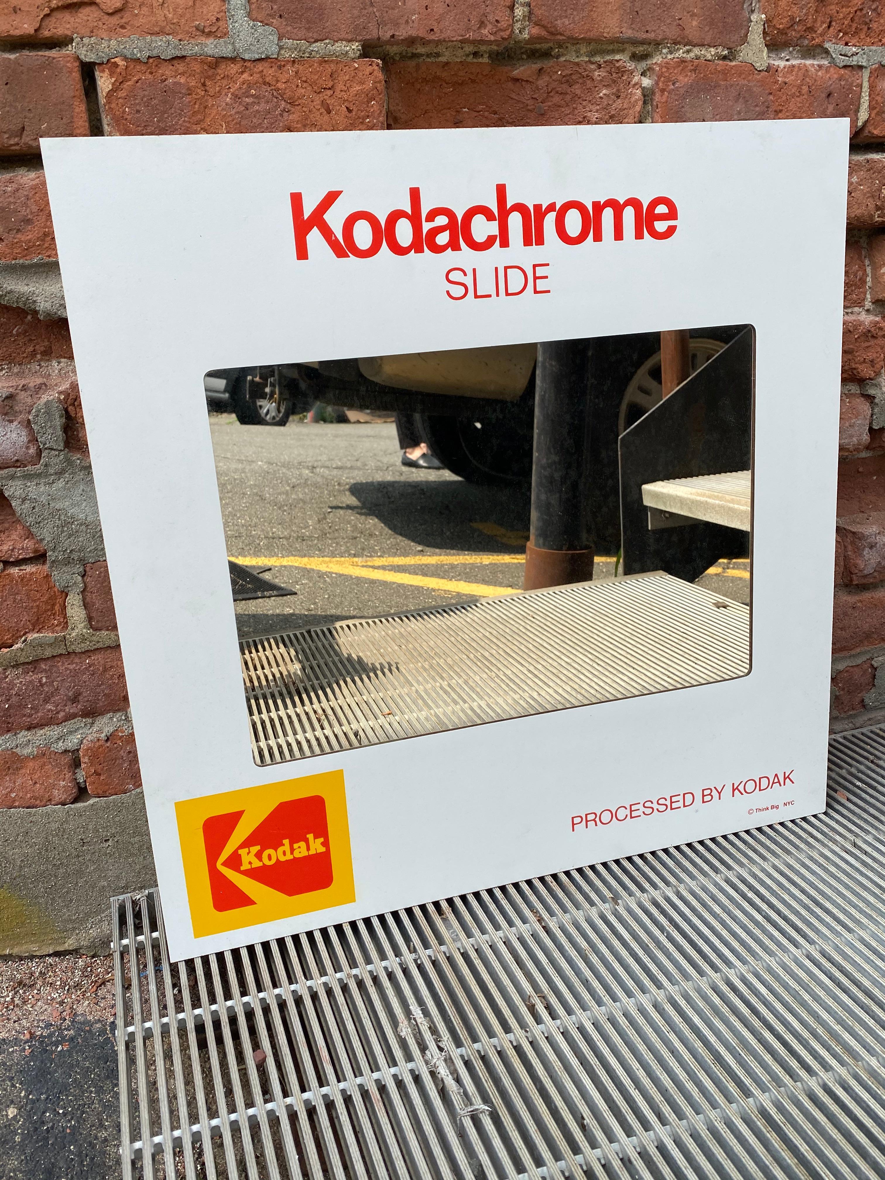 Straight from Think Big, NYC, circa 1985. Kodachrome slide mirrored wall vanity cabinet. Two fixed shelves. A great Pop-Art oversized, utilitarian piece. Masonite, wood and mirror construction.

Approximately 3.5