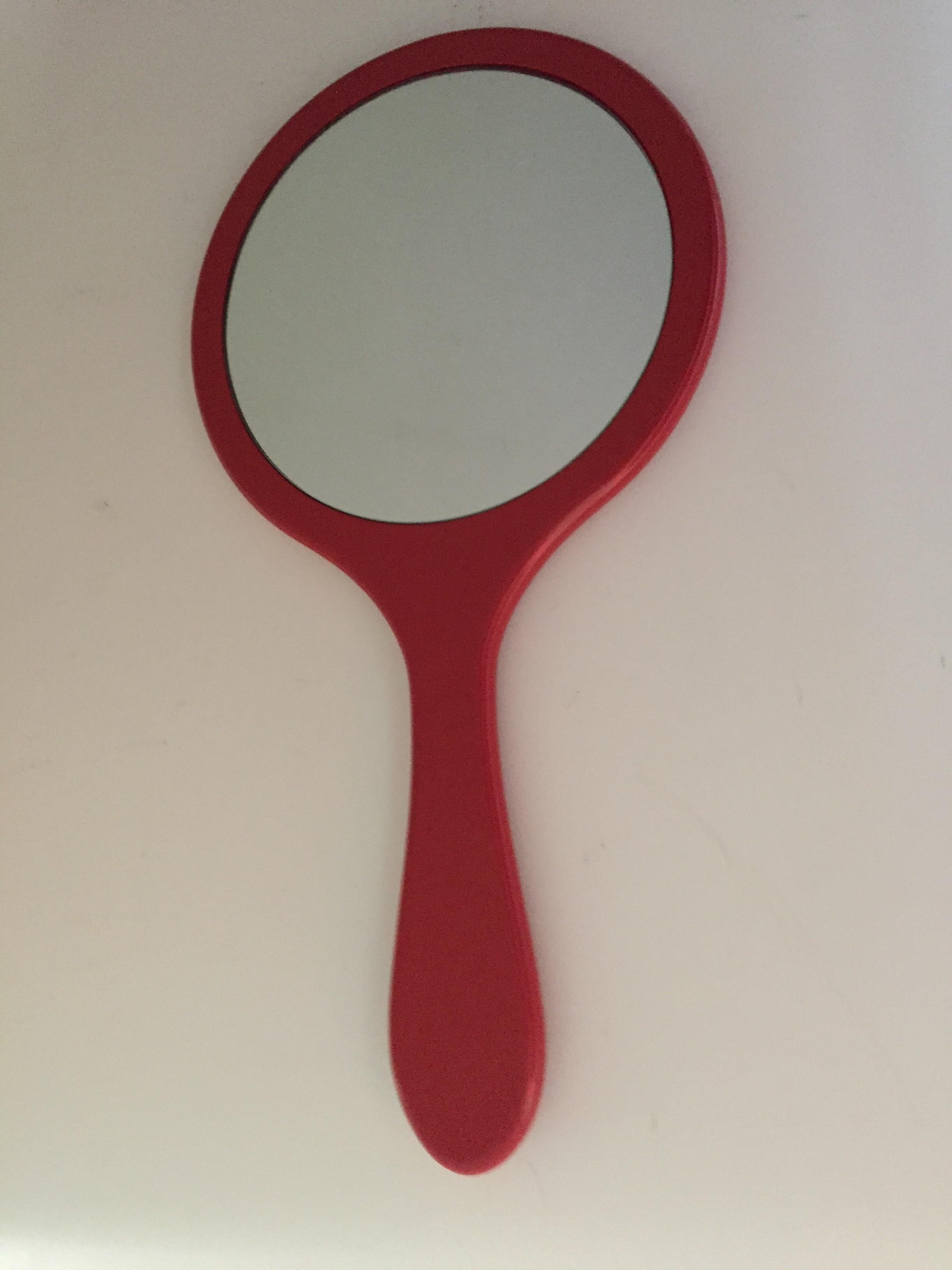 Think big extra-large hand mirror design red lacquer mirror, adjustable angle to hang many ways, one side plain red lacquer, stamped Think Big NYC, 1986.