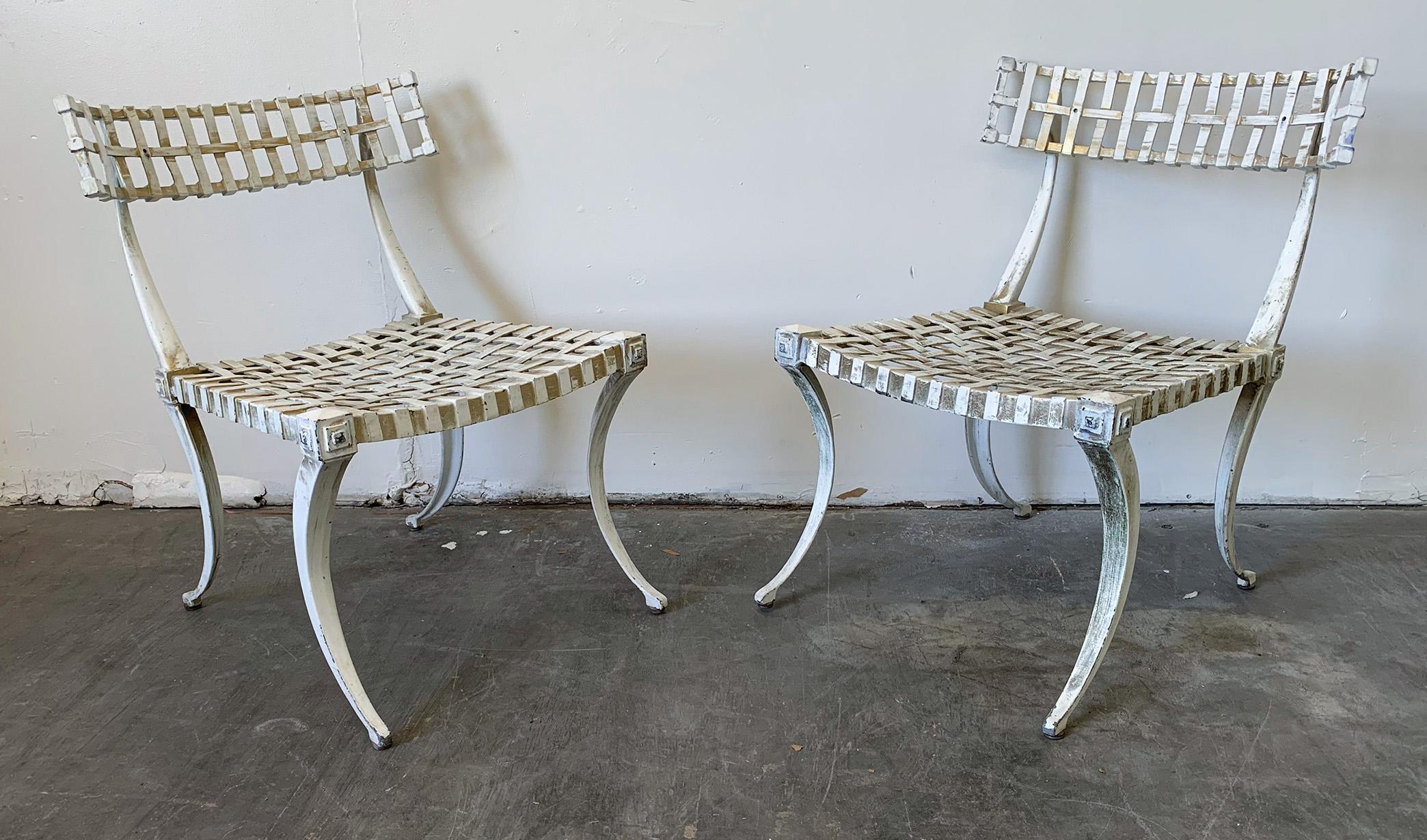 Priced for the pair-- 

Available right now we have this stunning pair of Klismos chairs by Thinline, a prominent furniture manufacturer of outdoor furniture throughout the 20th century. This Klismos design has been used by a couple designers in the