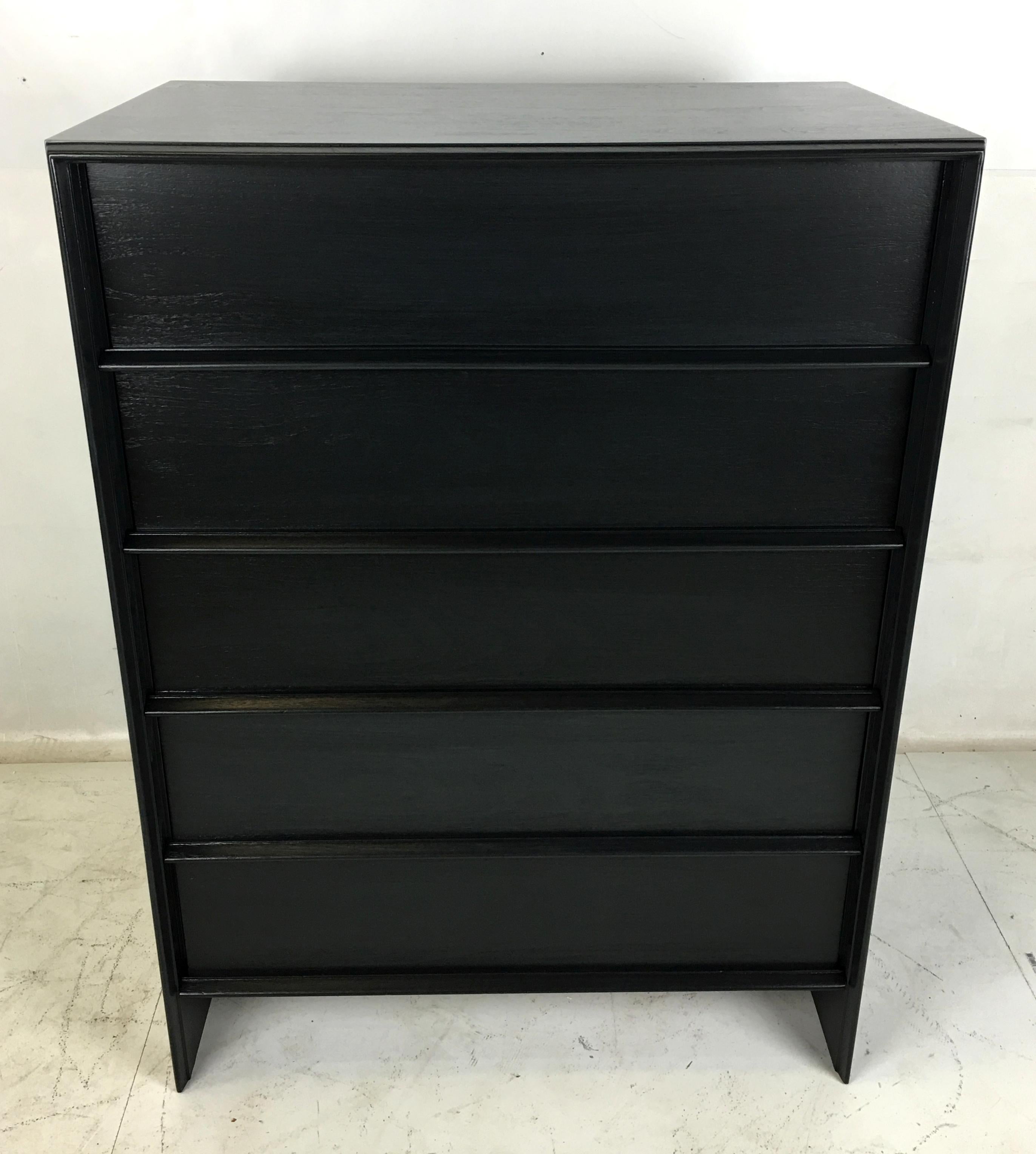 Gorgeous tall dresser from Robsjohn-Gibbings' coveted Thinline Collection by Widdicomb that has been meticulously refinished in our in-house refinishing shop in open grain Charcoal/Black lacquer-glaze. The dresser is in like new condition. This