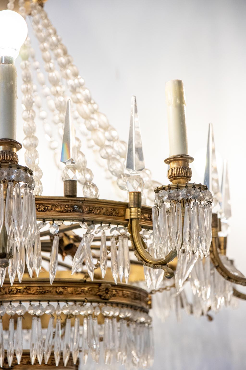 20th Century Thirteen Arm Crystal and Bronze Three Tier Chandelier For Sale