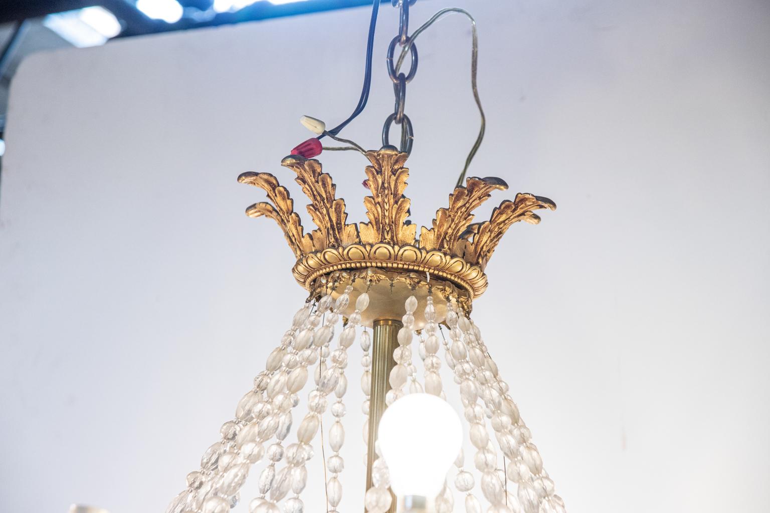 Thirteen Arm Crystal and Bronze Three Tier Chandelier For Sale 1