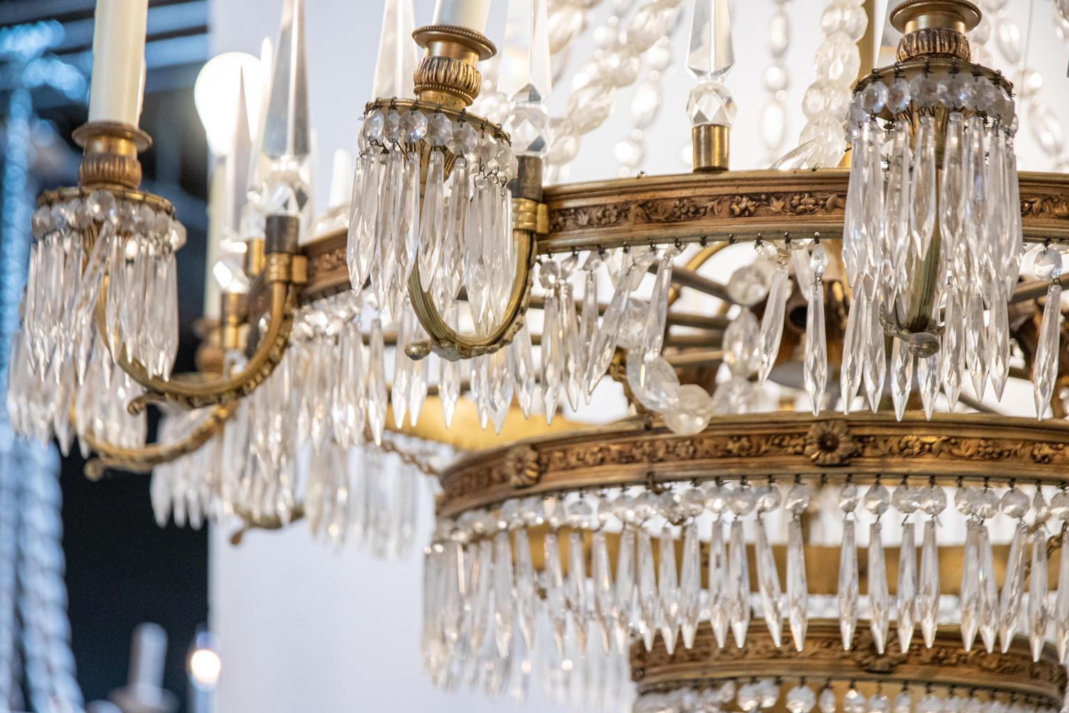 Thirteen Arm Crystal and Bronze Three Tier Chandelier For Sale 2