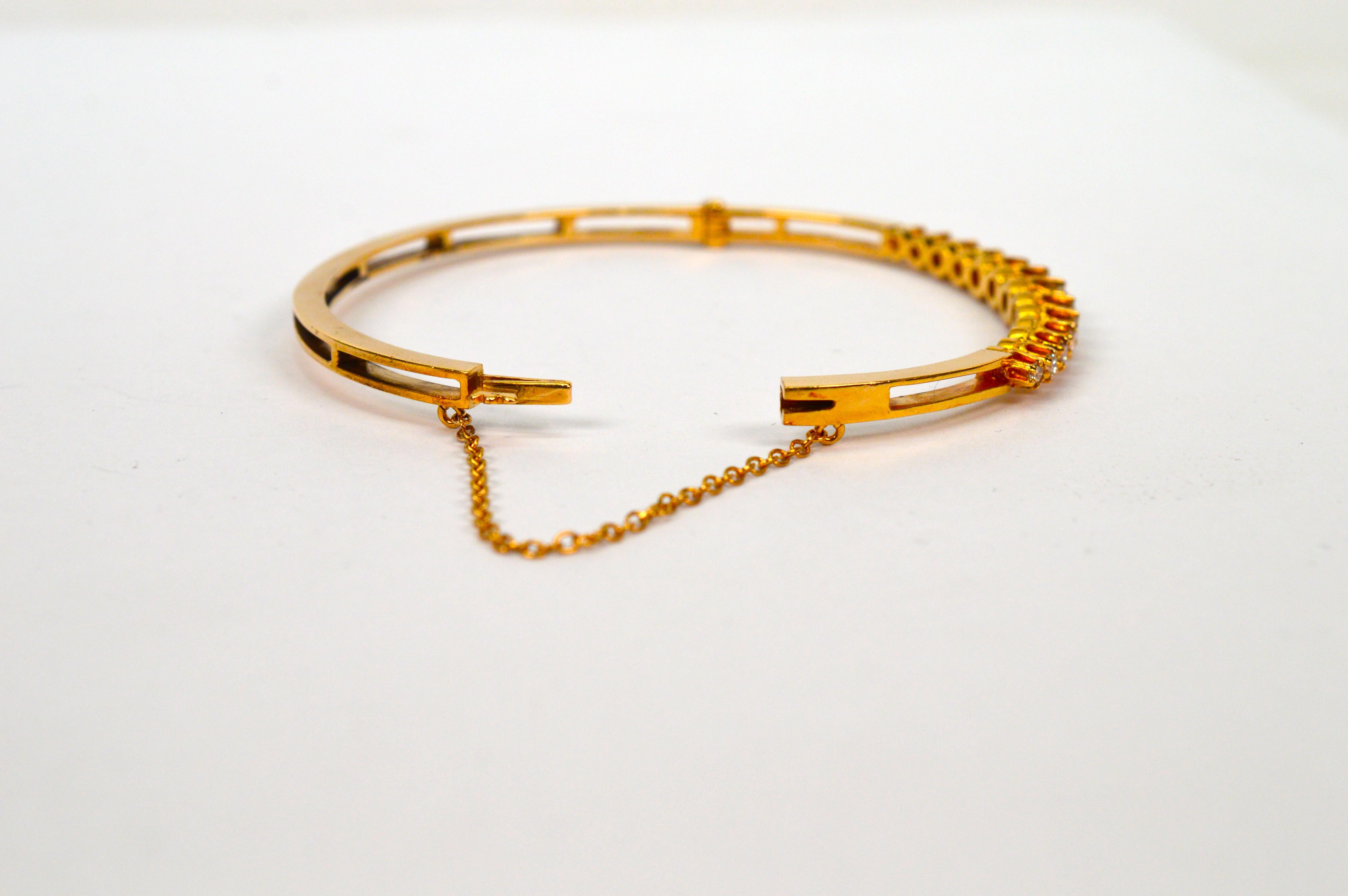 Thirteen Diamond 14 Karat Yellow Gold Bangle Bracelet In Excellent Condition For Sale In Mount Kisco, NY