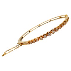 Thirteen Diamond 14 Karat Yellow Gold Bangle Bracelet