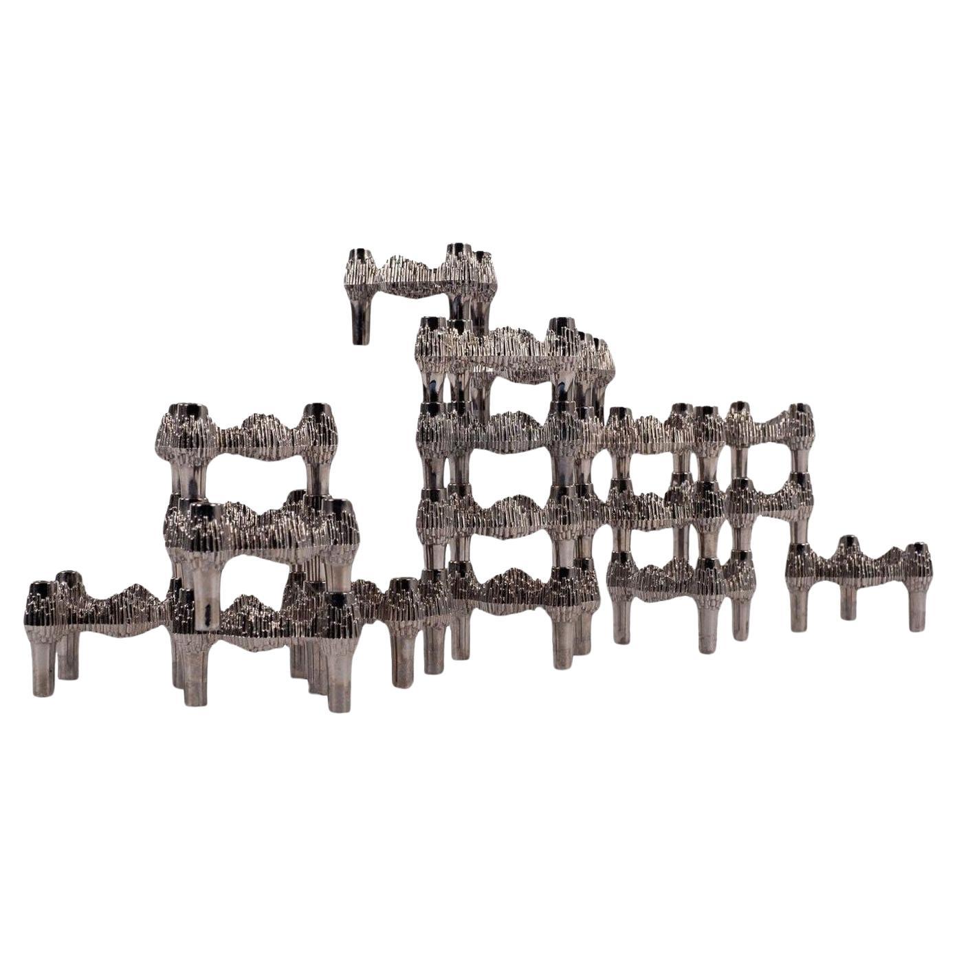 Thirteen Original Nickel-Plated Variomaster Candleholders For Sale