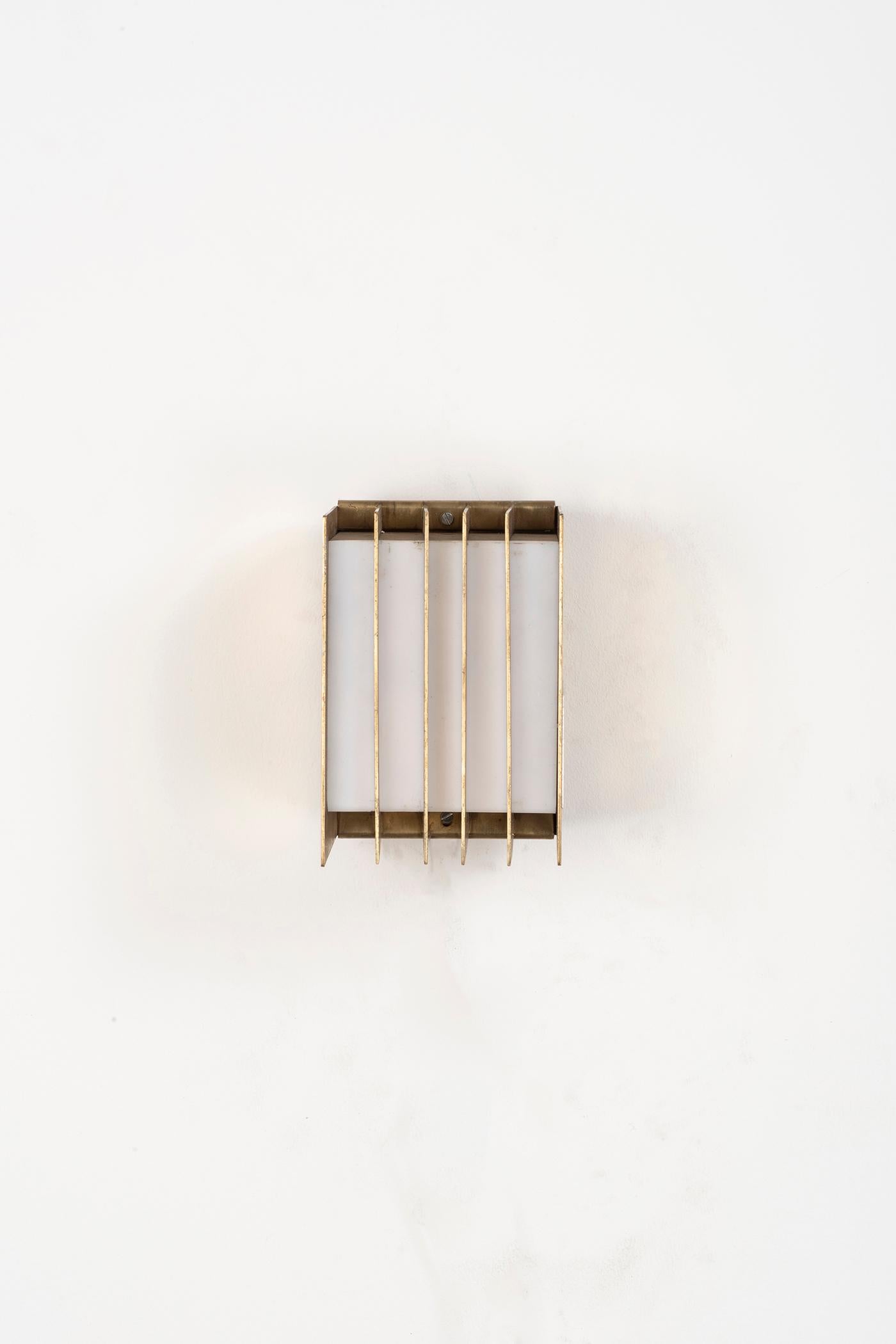 Thirteen wall lamps by Lars Gunnar-Nordstro¨m.
Finland, circa 1970. Provenance: Hotel Hesperia, Helsinki. Brass, plexiglass. 21.5 x 12.5 x H 20 cm. 8.4 x 4.9 x H 7.8 in.
Please note: Prices do not include VAT. VAT may be applied depending on the