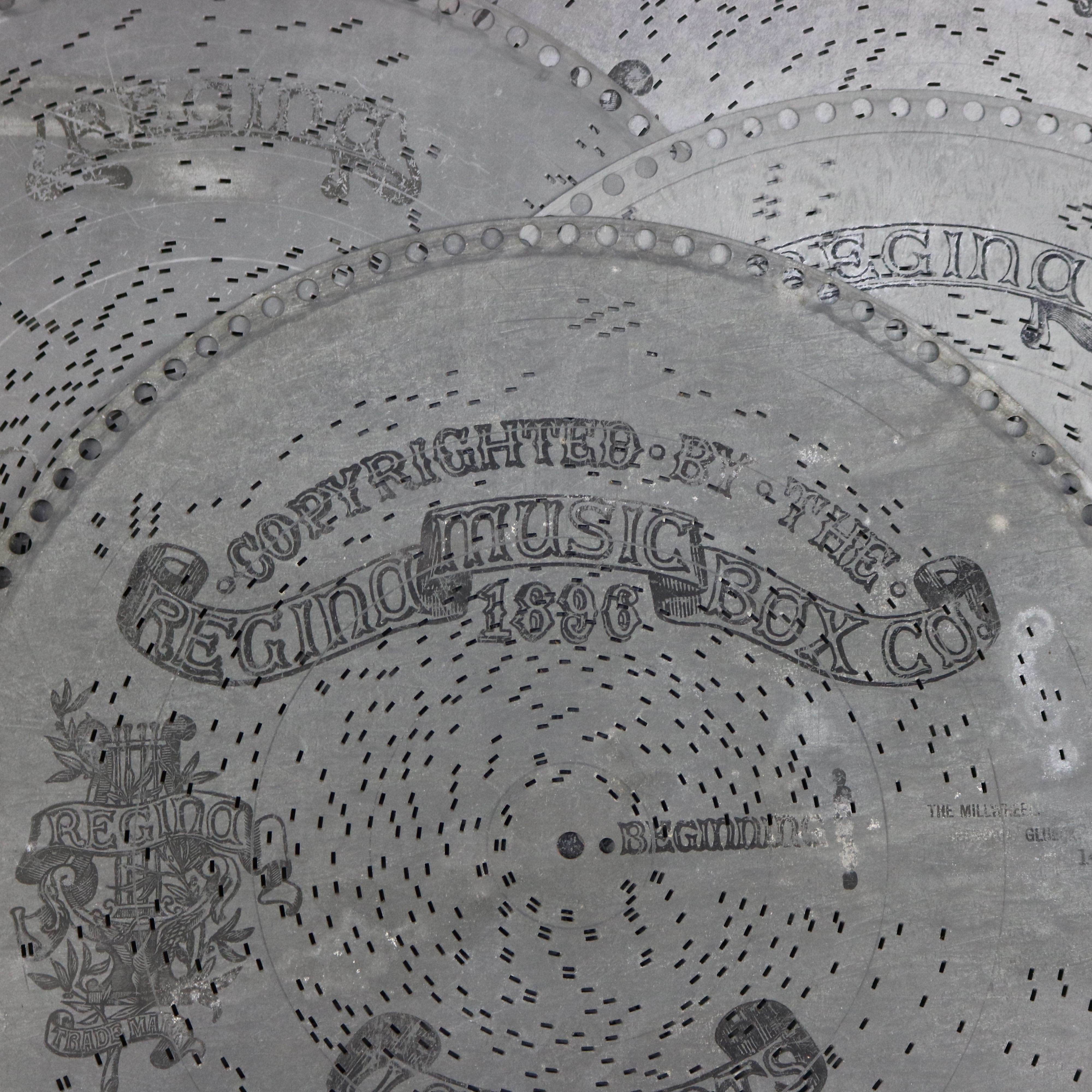 An antique set of 30 Regina music box discs, 15.25