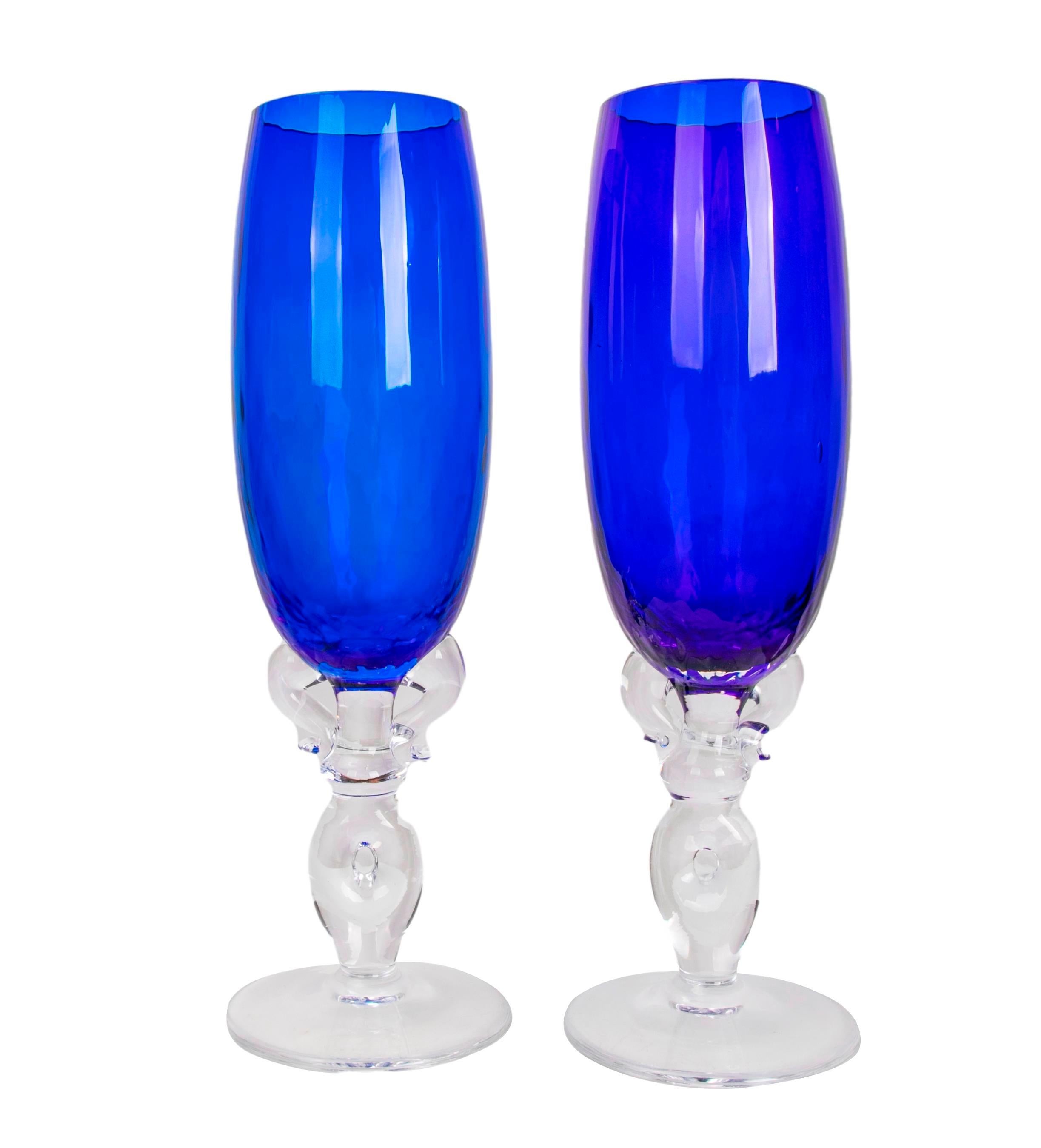 Thirty-four murano glass wine and champagne glasses in blue colour (18 wine glasses and 16 champagne glasses).