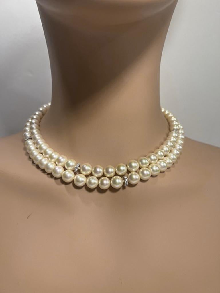 Thirty-six Inch Rope of  Faux Jewelry Japanese Cultured Style 8mm Pearls with CZ spacers Made for Bergdorf Goodman
Mint unused, unworn, superb handmade Japanese lustrous pearls lay next to fine Mikimoto and see no difference in colour and lustre.
