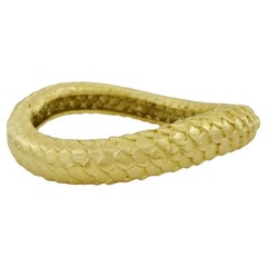 This Angela Cummings 18k yellow gold bangle bracelet 97 grams