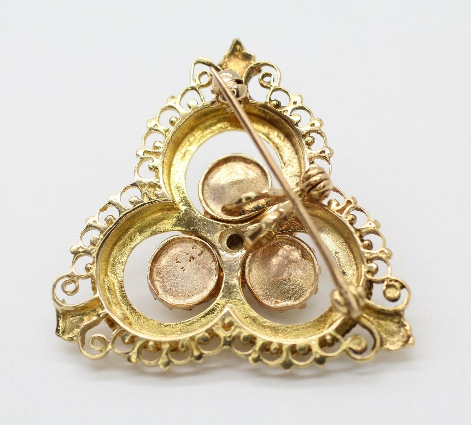 Artisan This Antique 14 Karat Yellow Gold Brooch with Pearls and Diamonds in the Center